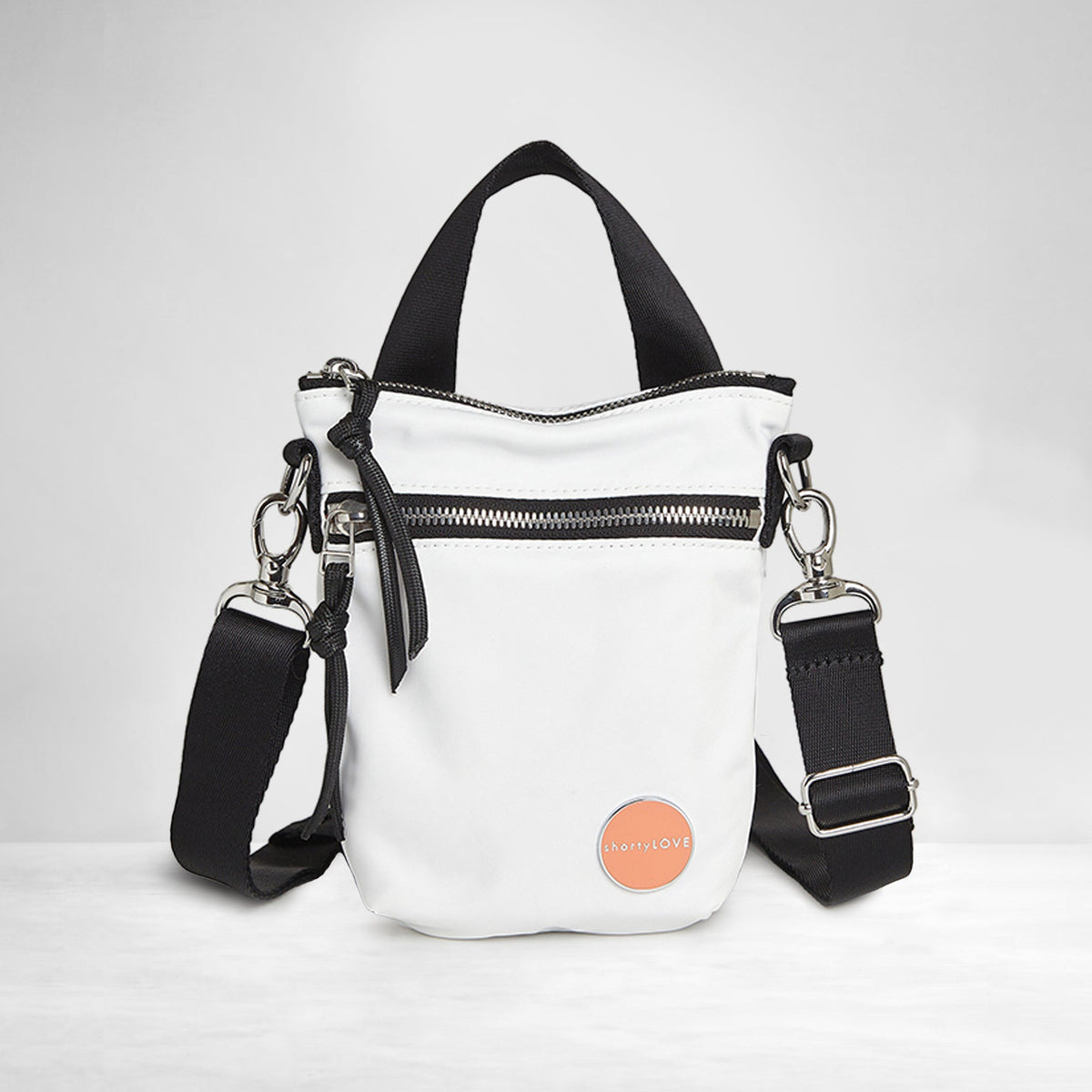 shortyLOVE shorthand women’s designer crossbody handbag in white; front view against white background