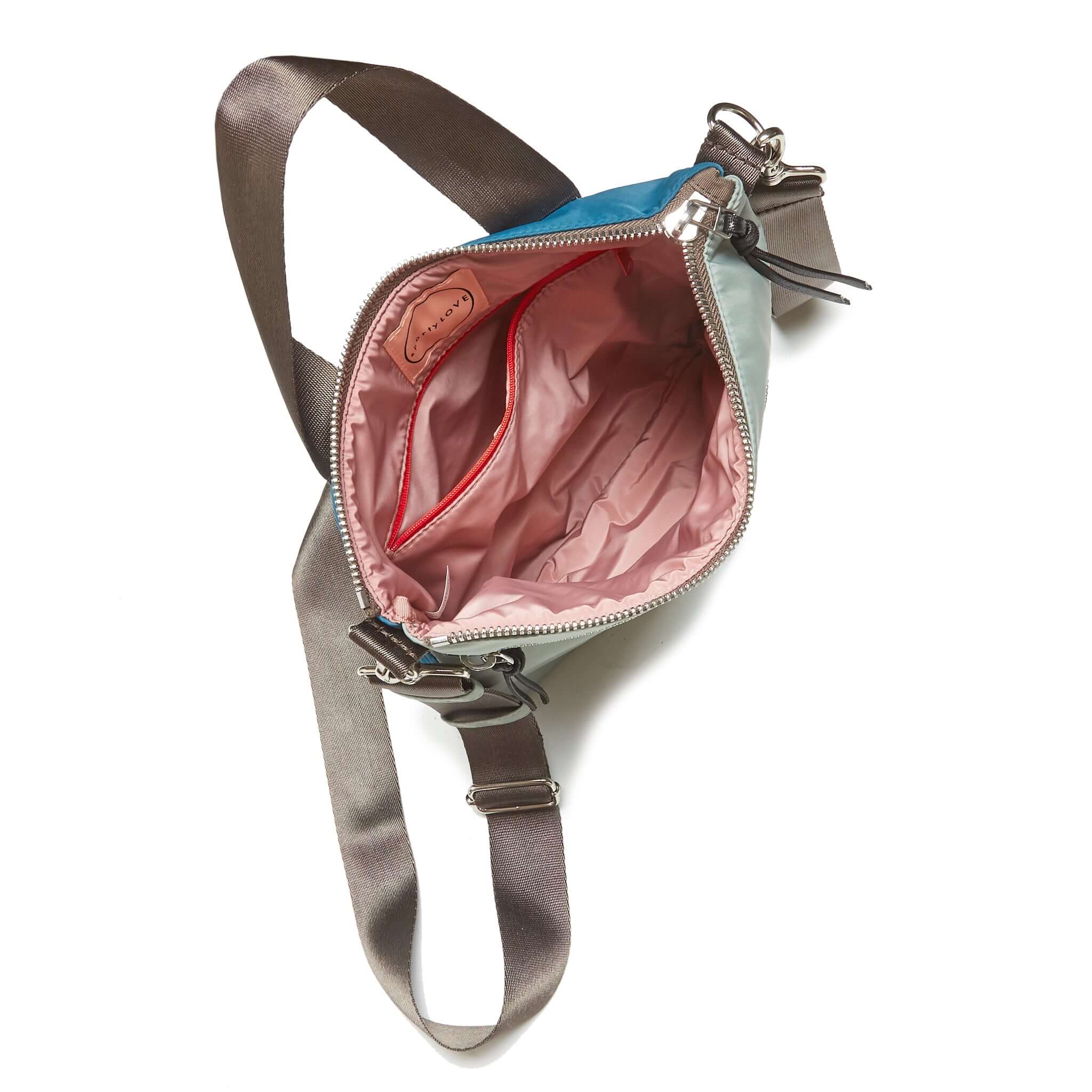 shortyLOVE amuse medium sized crossbody bag in slate/teal; top-down view showing interior slate/teal lining against white background.