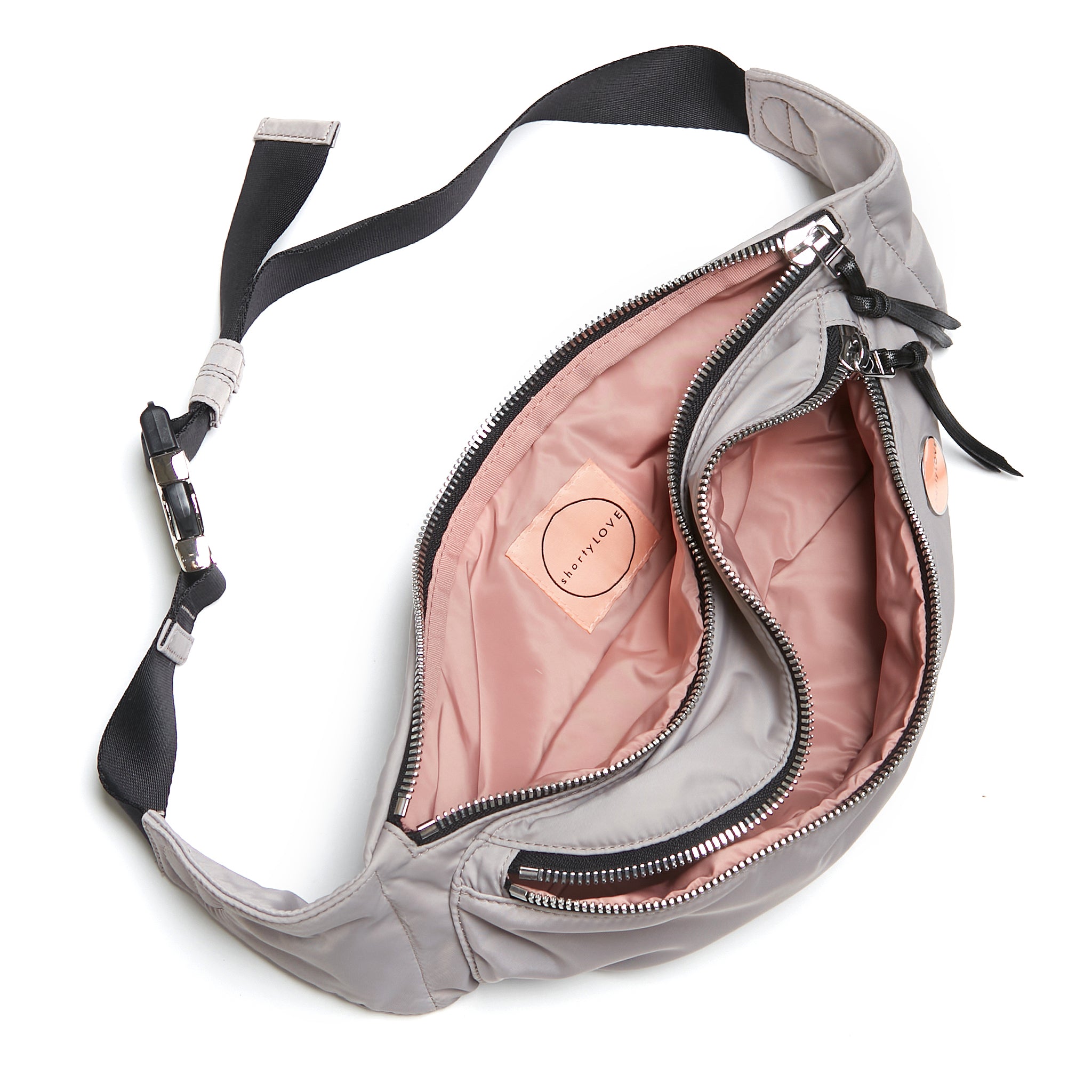 shortyLOVE arcade belt bag in grey; top-down view showing interior blush/red lining against white background.