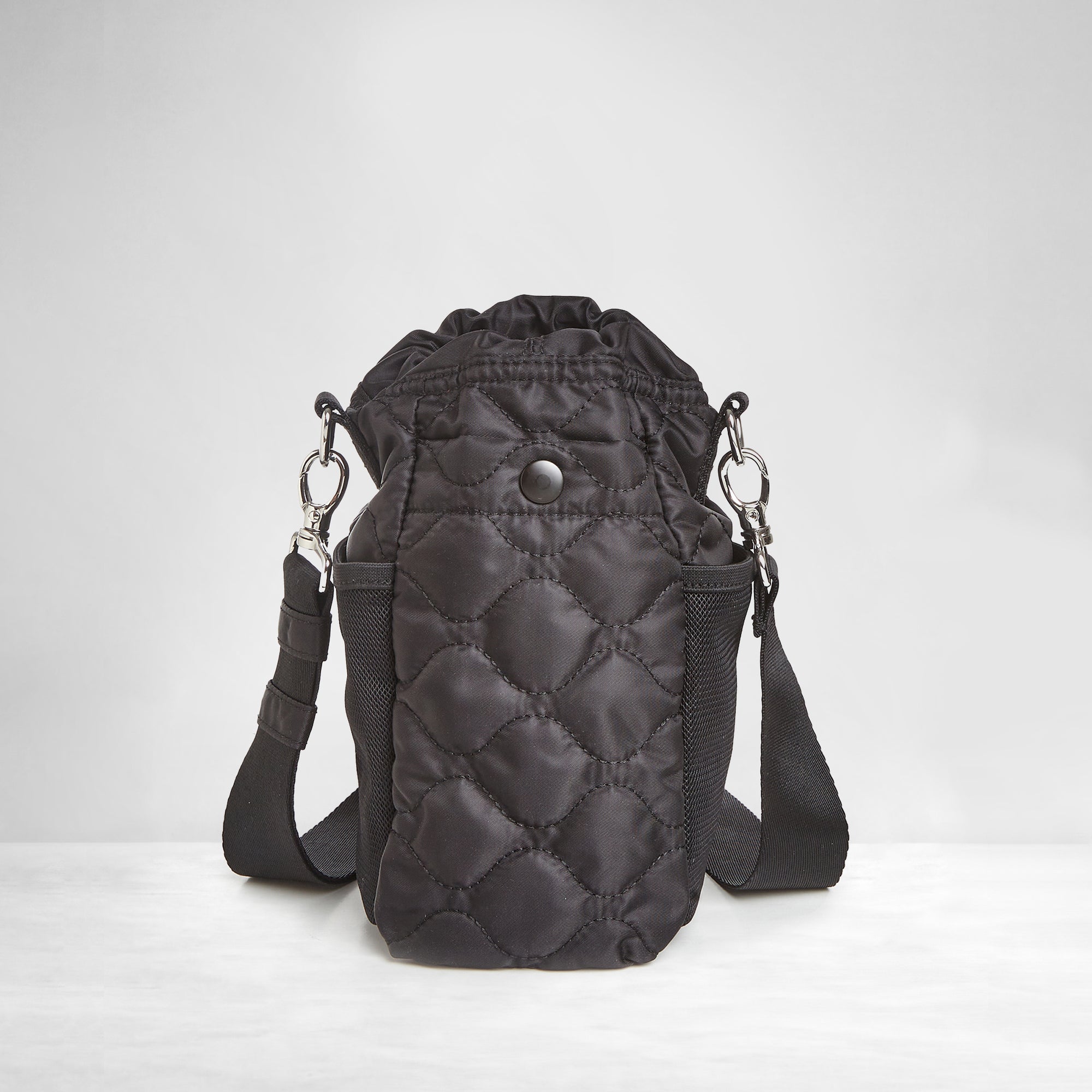 shortyLOVE bea sling bag in black; back view against grey background.