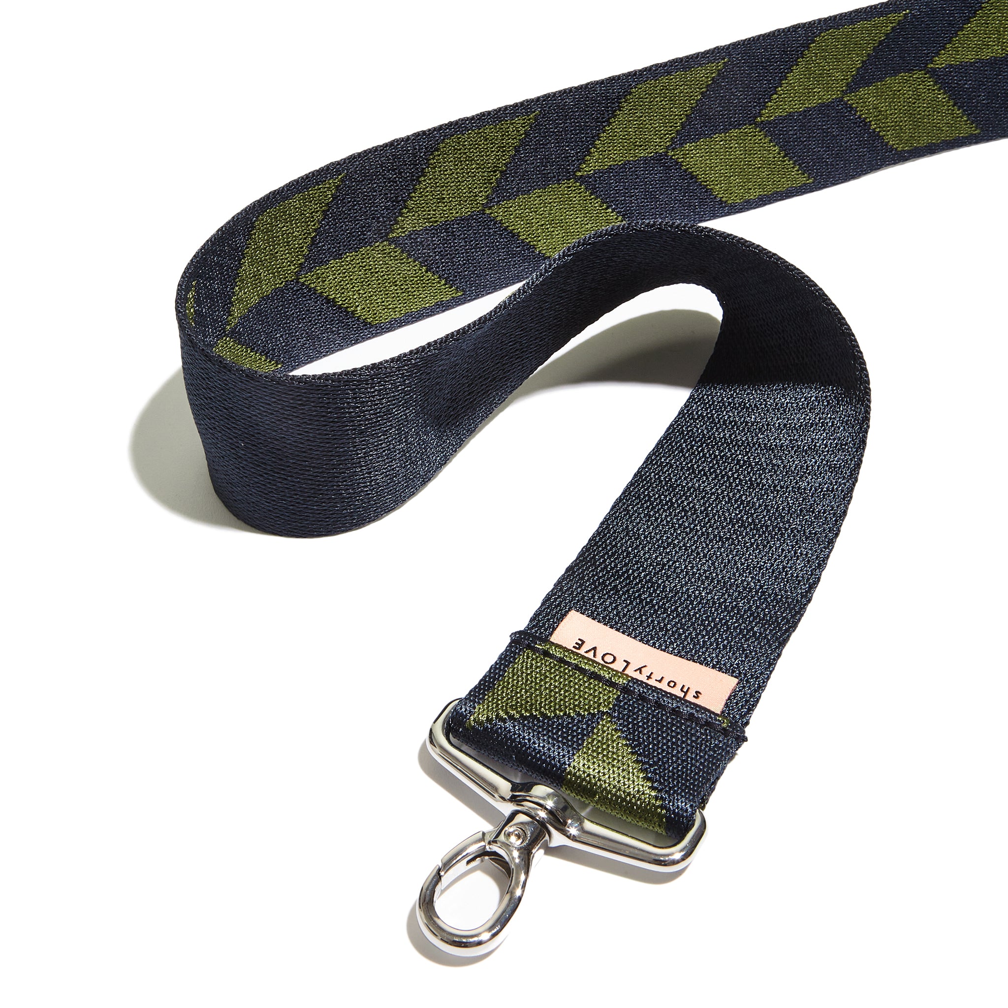 shortyLOVE boardwalk strap in the arrow design in midnight/sage; top view open against white background.