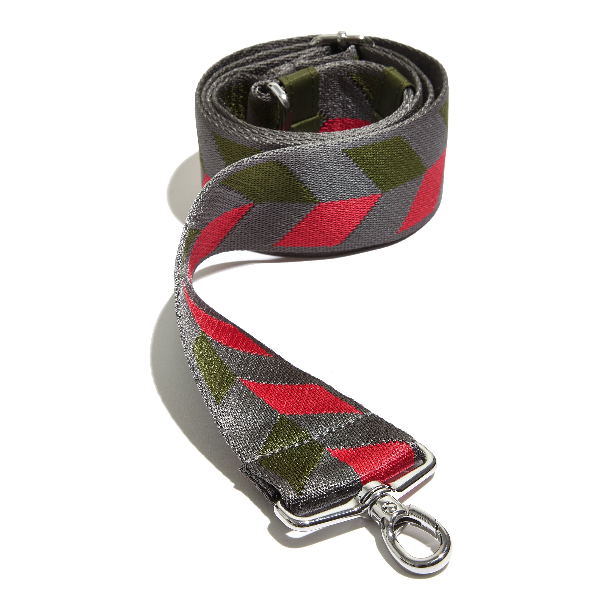 shortyLOVE boardwalk strap in arrow design in pewter/sage/magenta; front view rolled against white background.