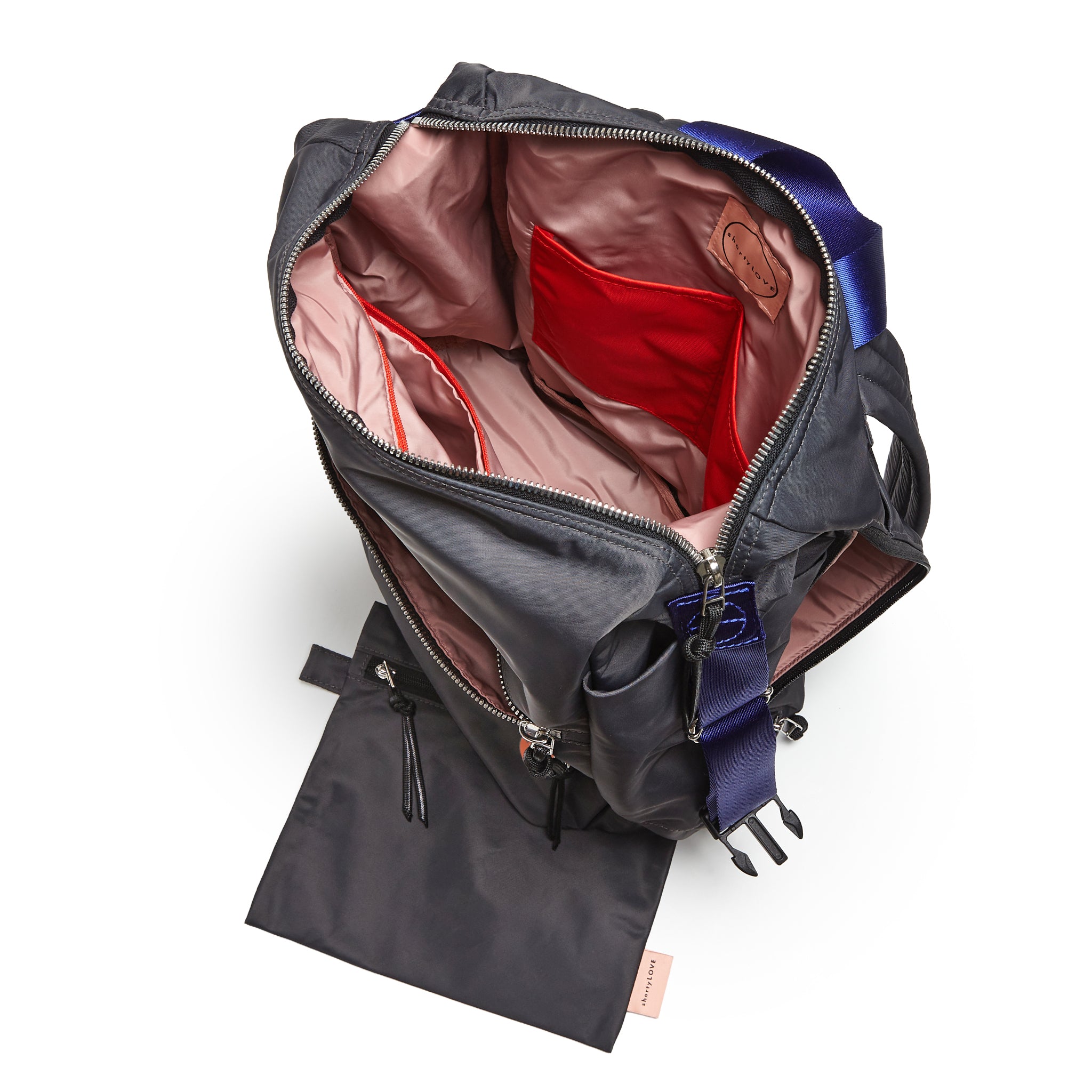 shortyLOVE boxer backpack in charcoal; top-down view showing interior blush/red lining against white background.