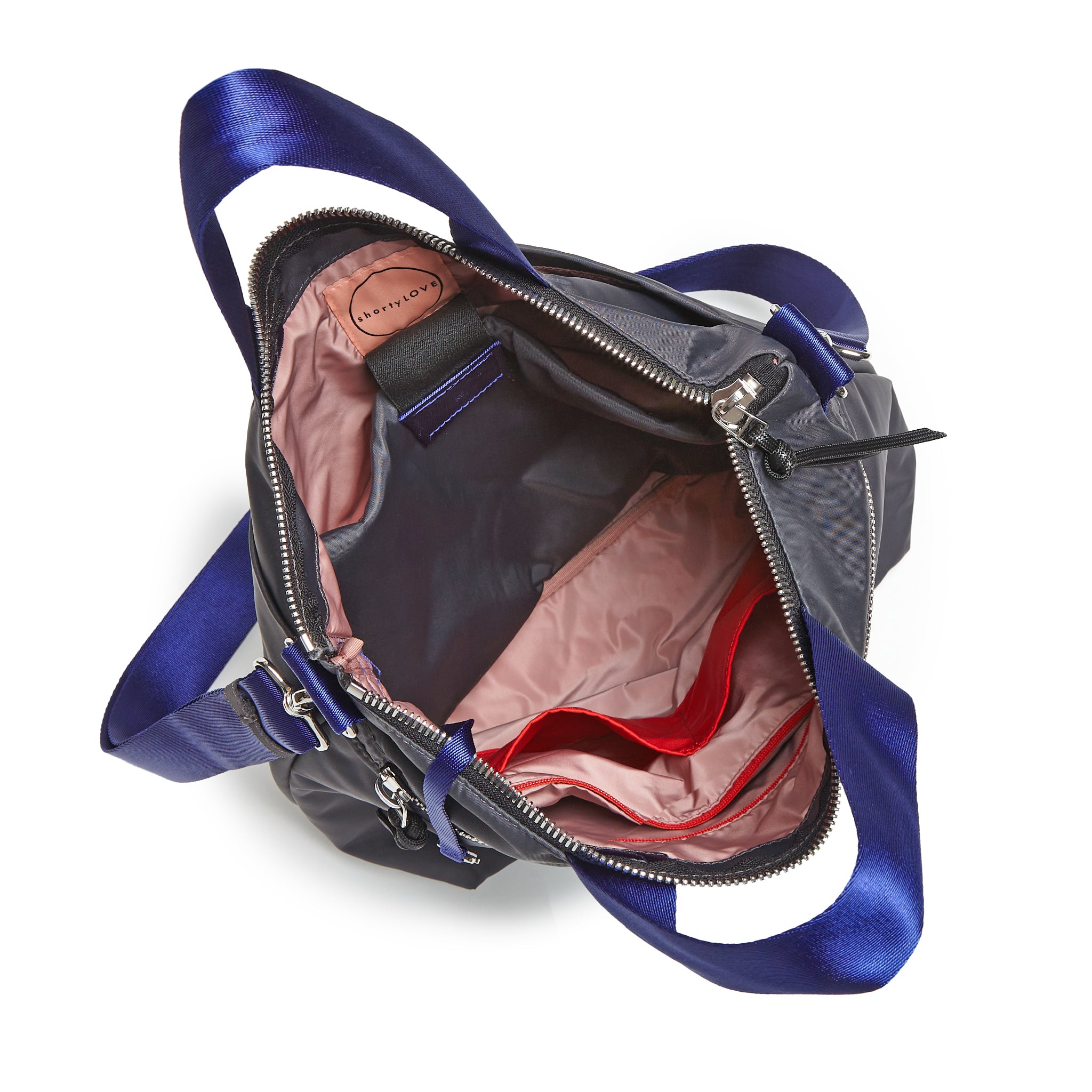 shortyLOVE wonder large crossbody/messenger bag in charcoal; top-down view showing interior blush/red lining against white background.