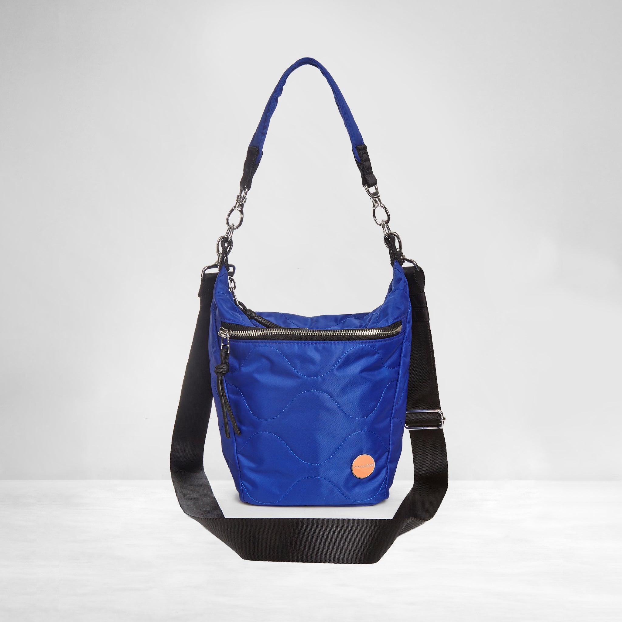shortyLOVE marcel crossbody bucket bag in electric blue; front view against white background.