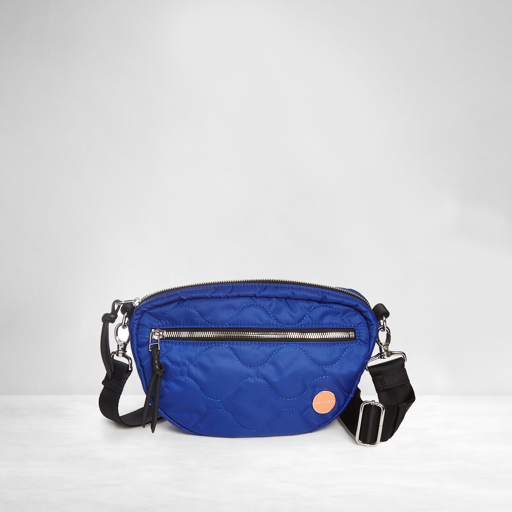 shortyLOVE small cruiser small crossbody bag in electric blue; front view against white background.