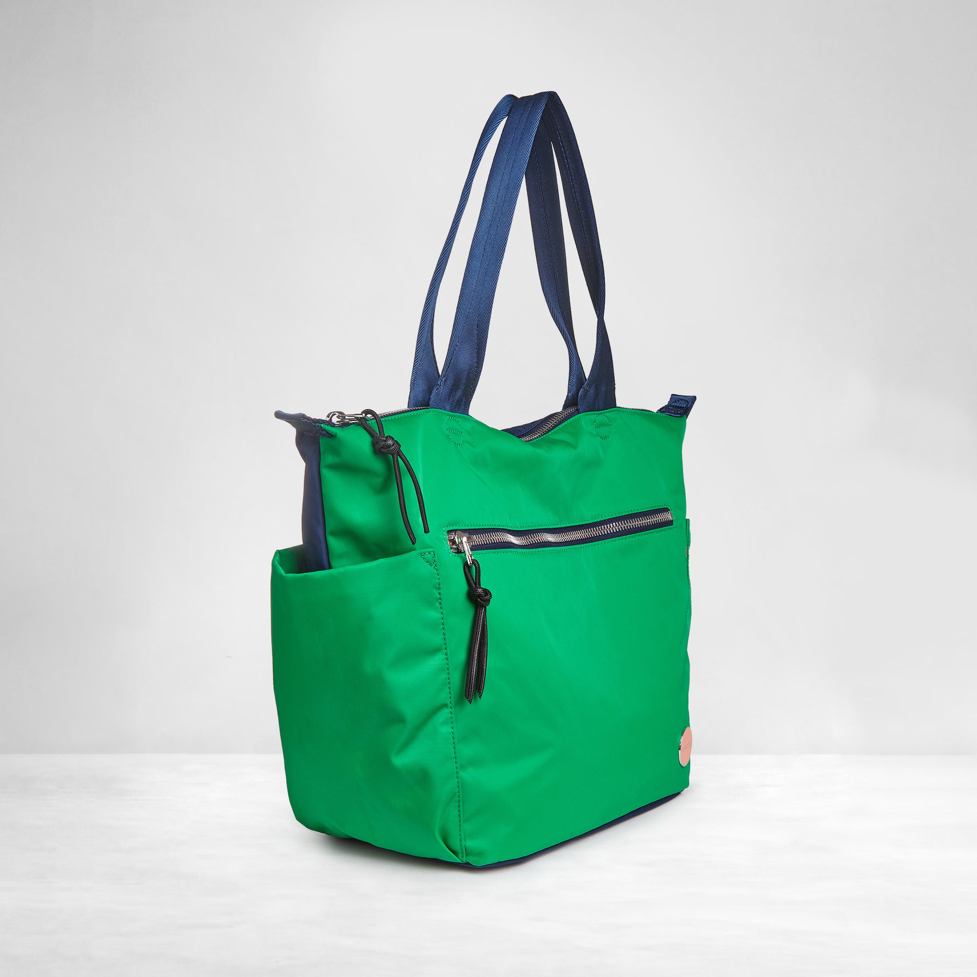 shortyLOVE tillie tote bag in grass green/navy; side angle view against white background.