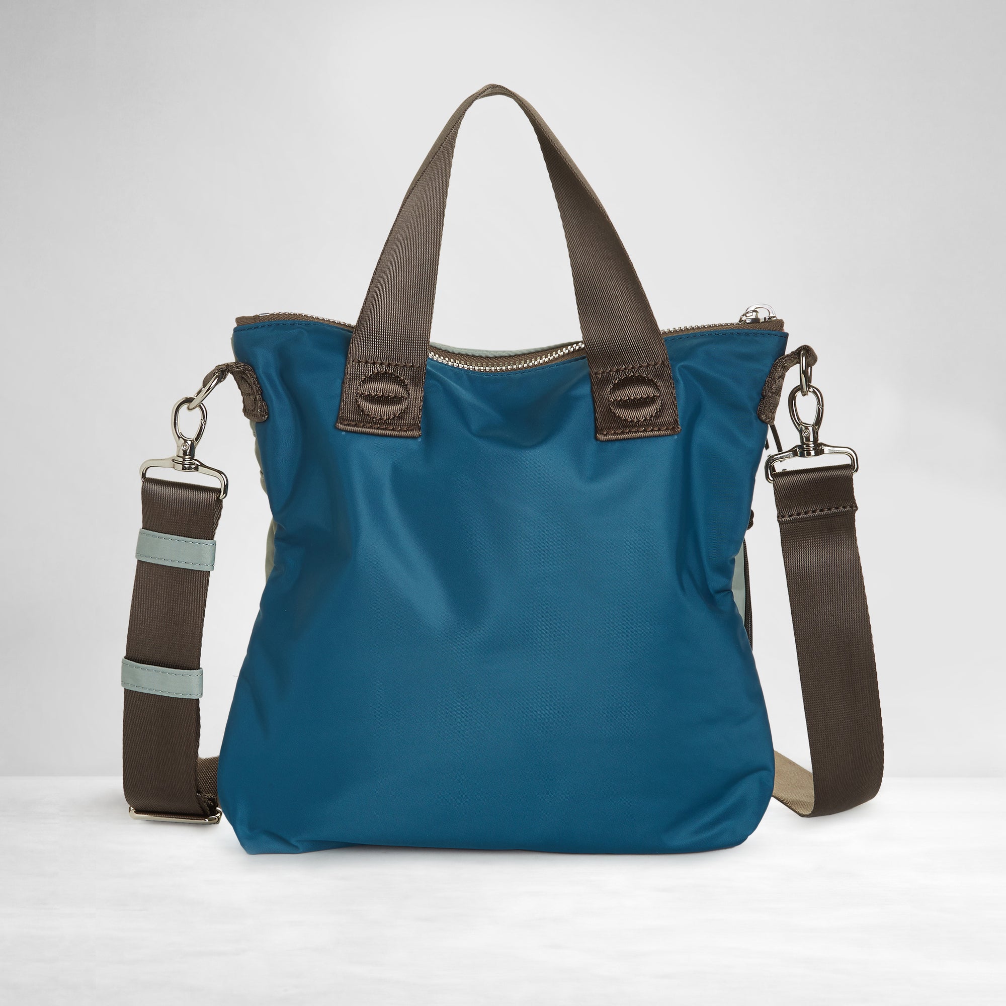 shortyLOVE amuse medium sized crossbody bag in slate/teal; back view against white background.