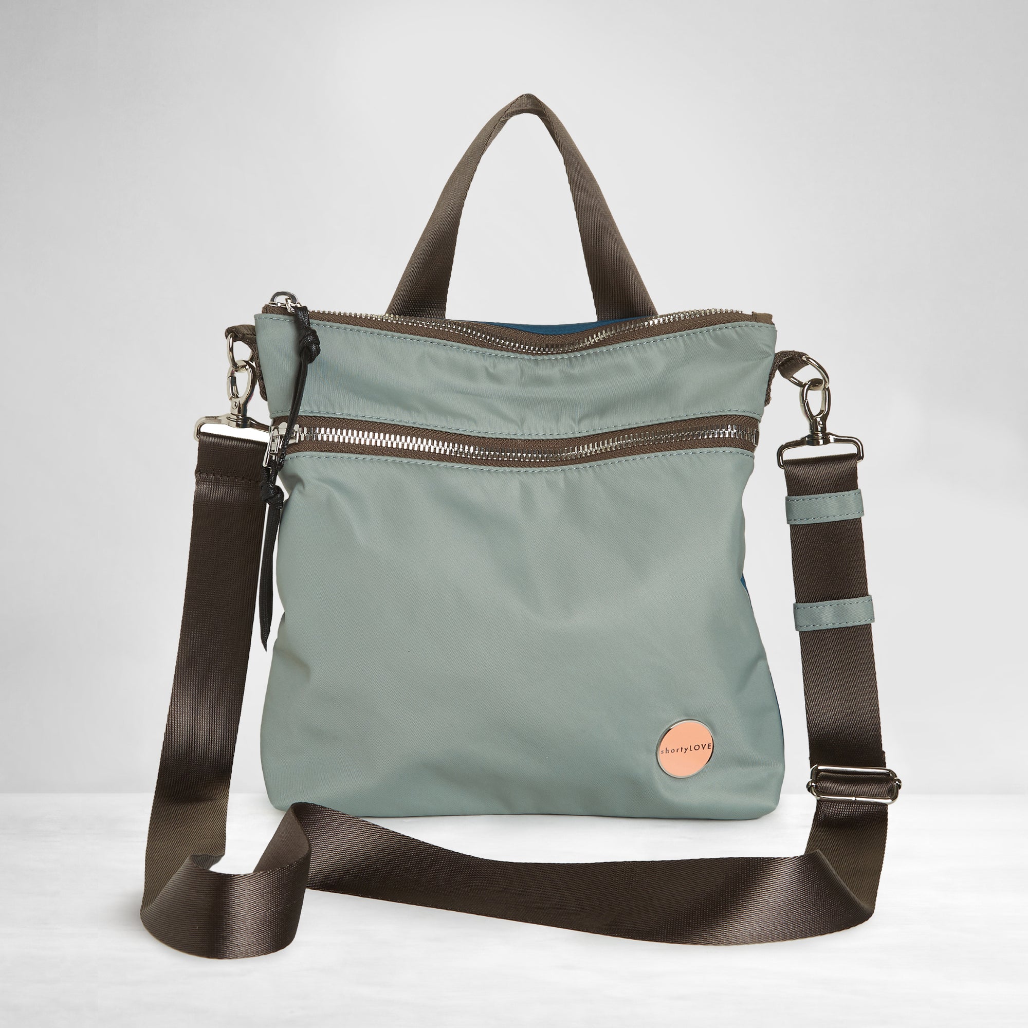 shortyLOVE amuse medium sized crossbody bag in slate/teal; front view against white background.