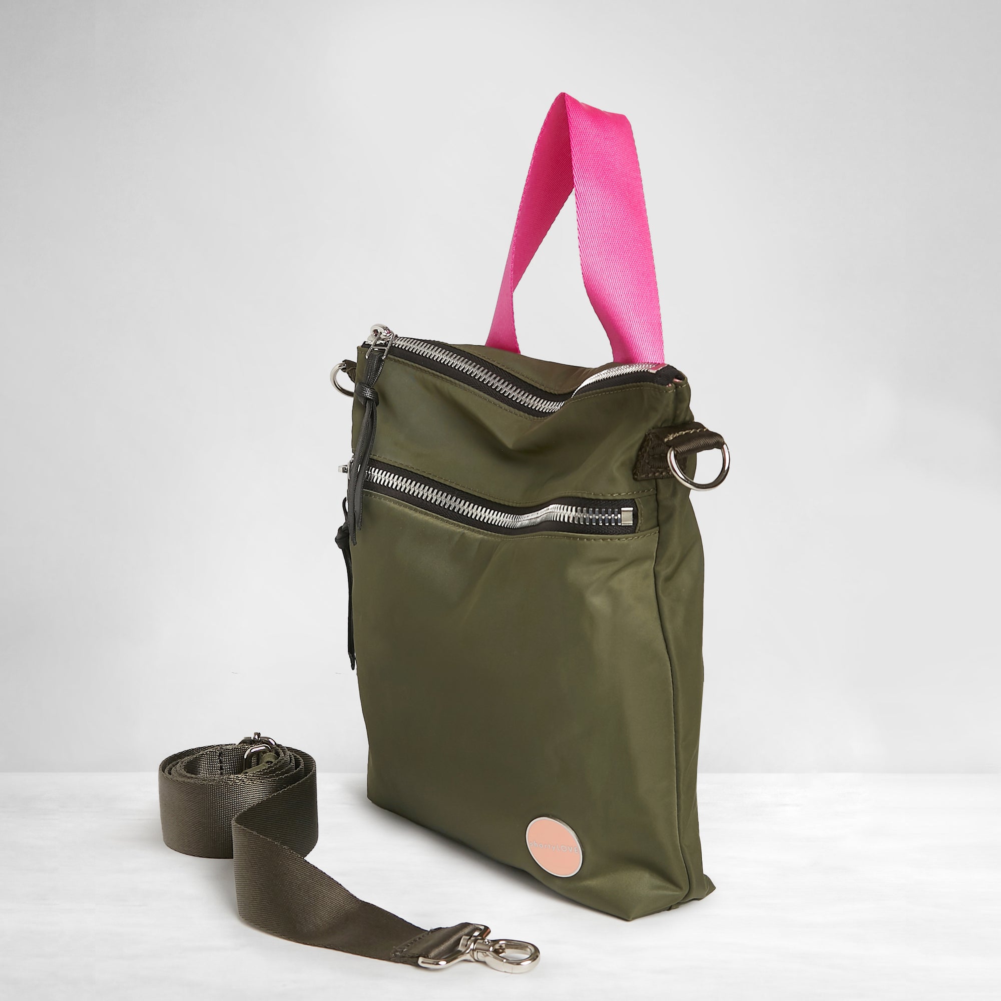 shortyLOVE amuse medium sized crossbody bag in army green; side angle view against white background.