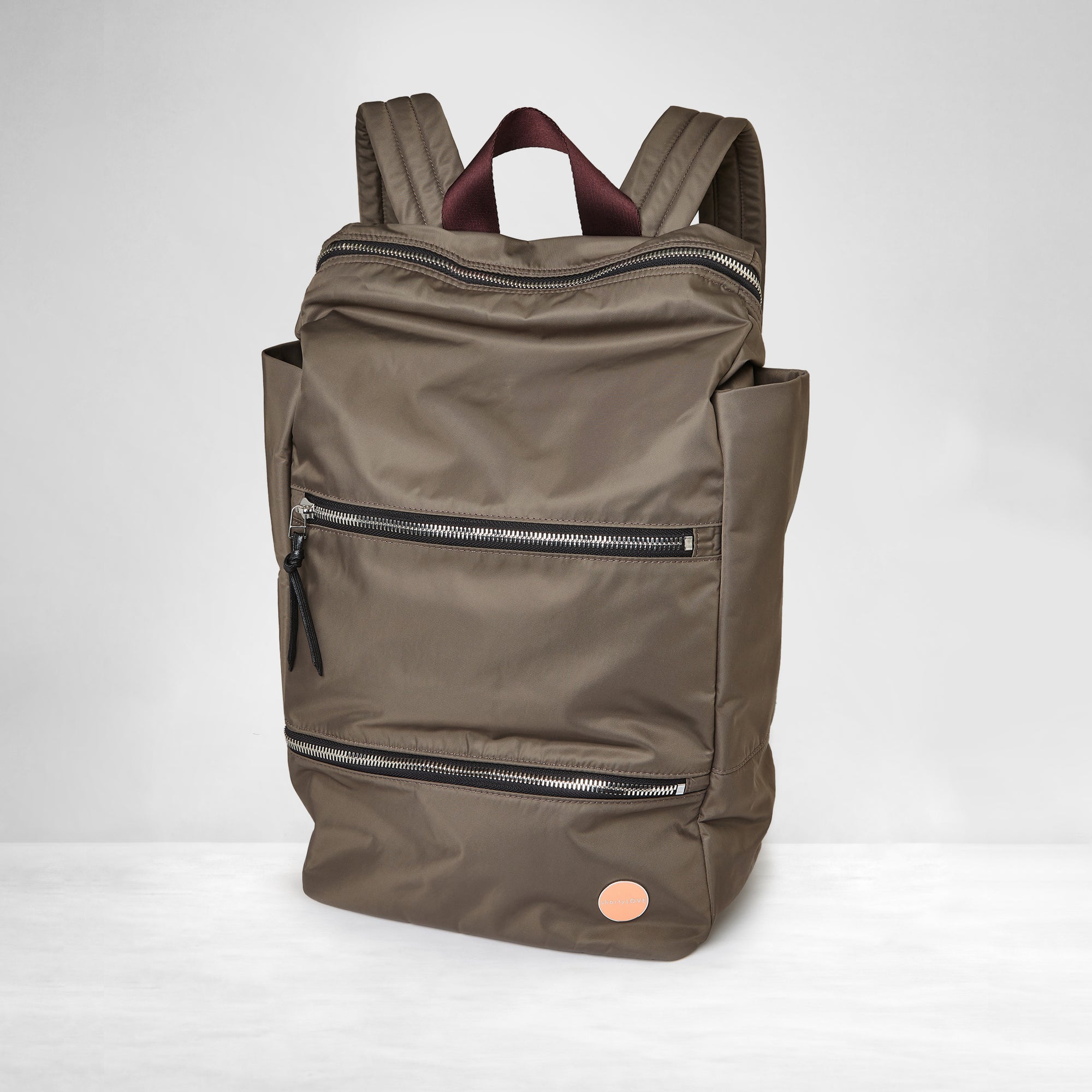shortyLOVE boxer backpack in mocha; front view against white background.