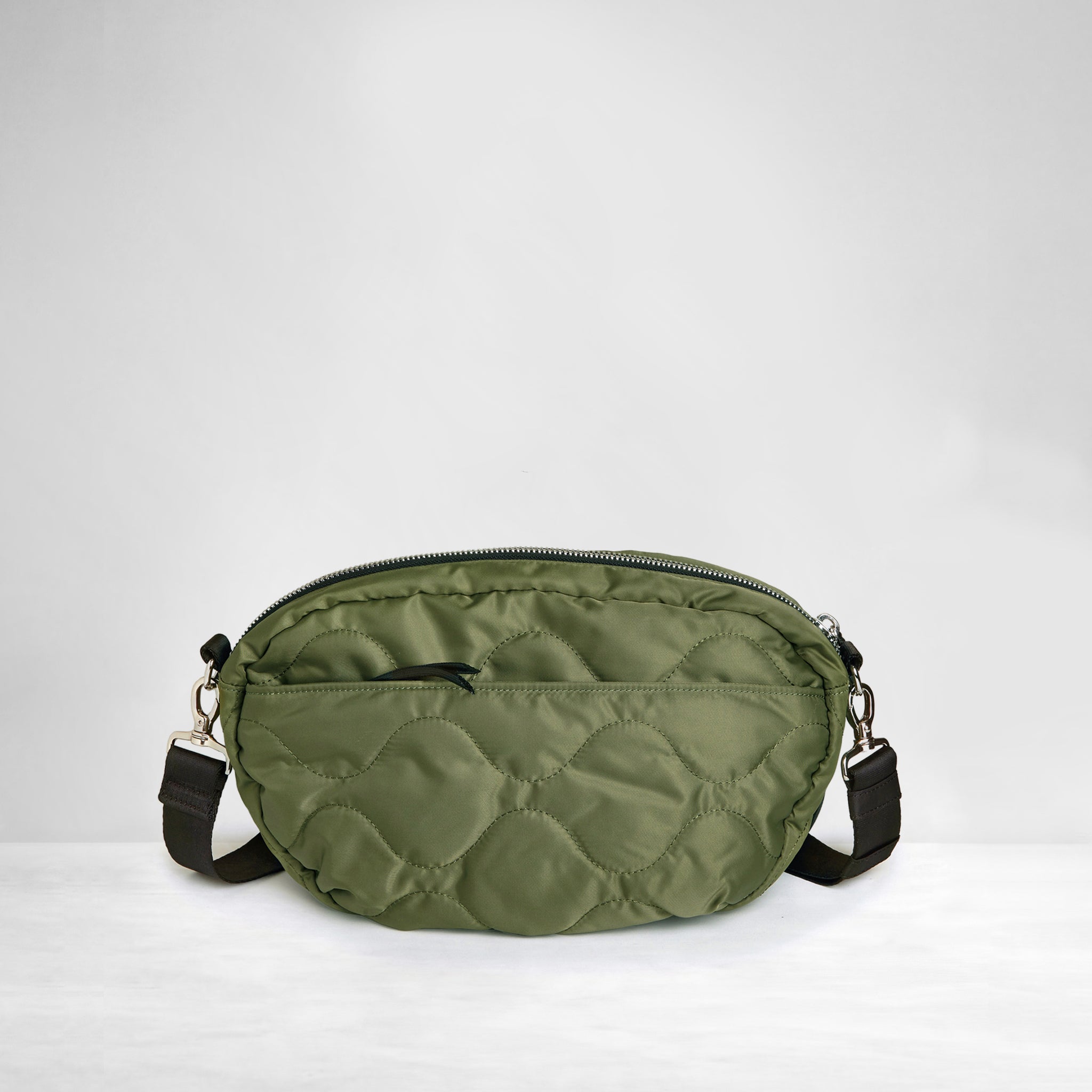 shortyLOVE cruiser medium crossbody bag in sage; back view against white background.