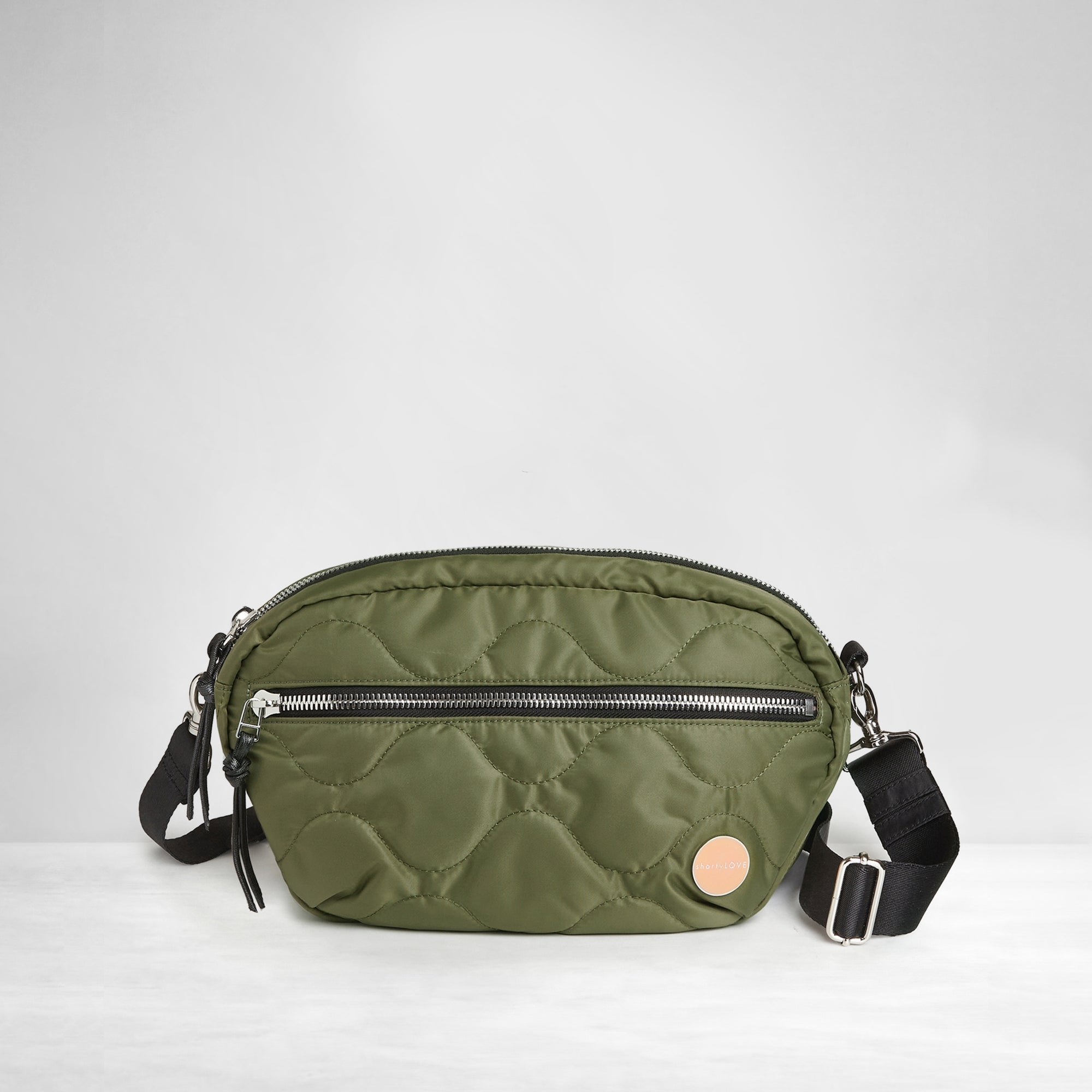 shortyLOVE cruiser medium crossbody bag in sage; front view against white background.