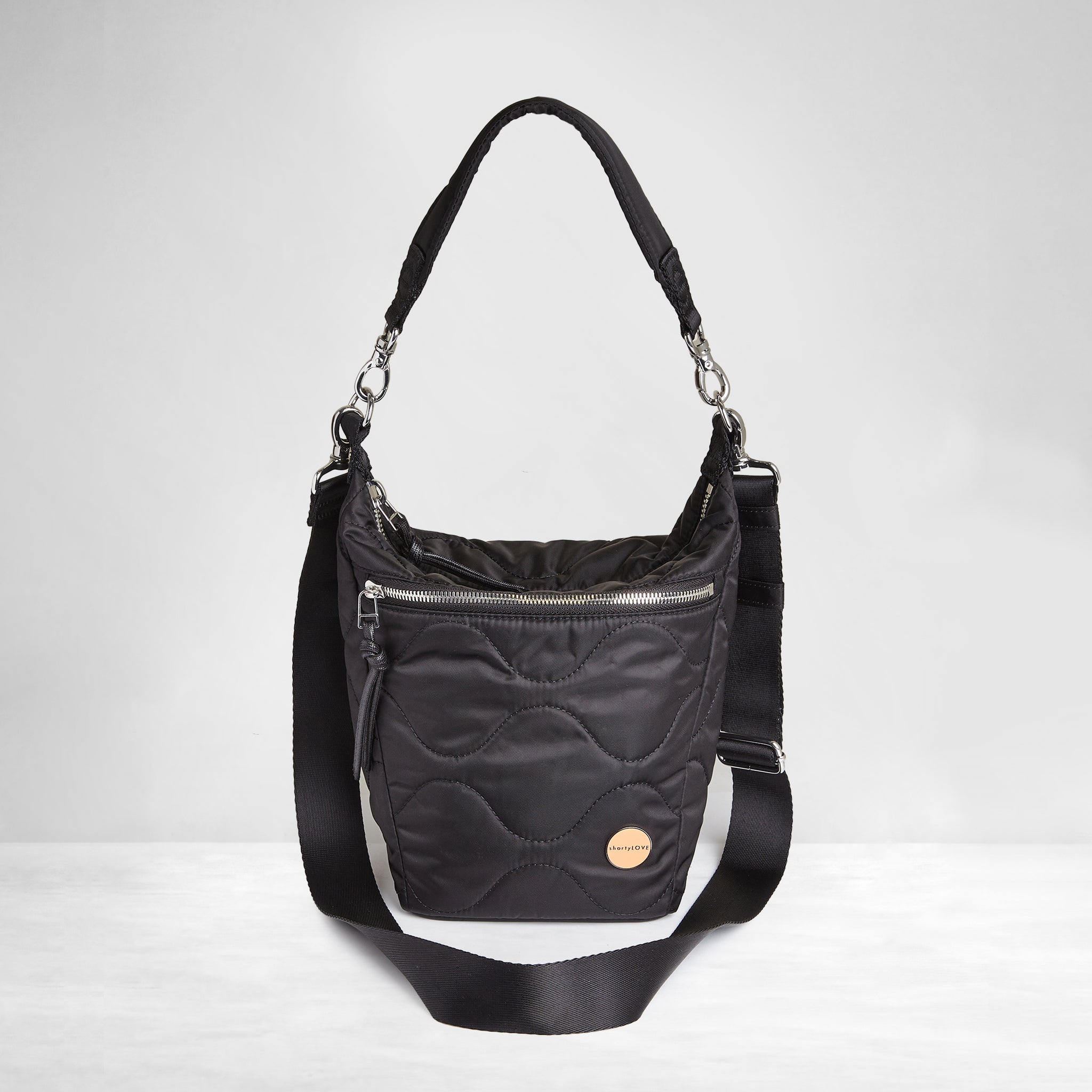 shortyLOVE marcel women’s nylon crossbody bucket handbag in black; front view against white background