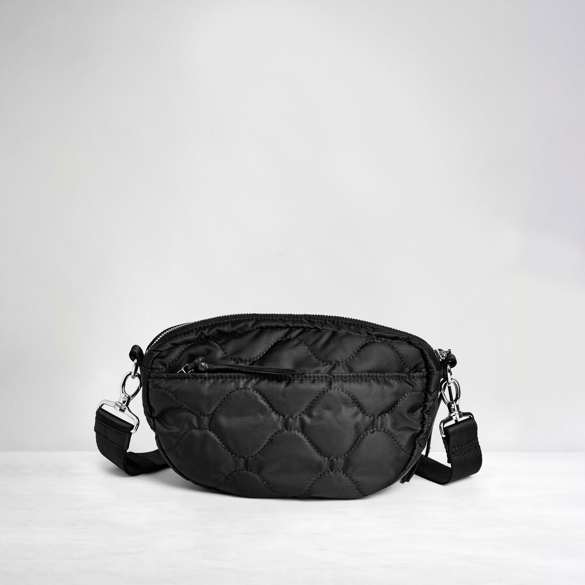 shortyLOVE small cruiser small crossbody bag in black; back view against white background.