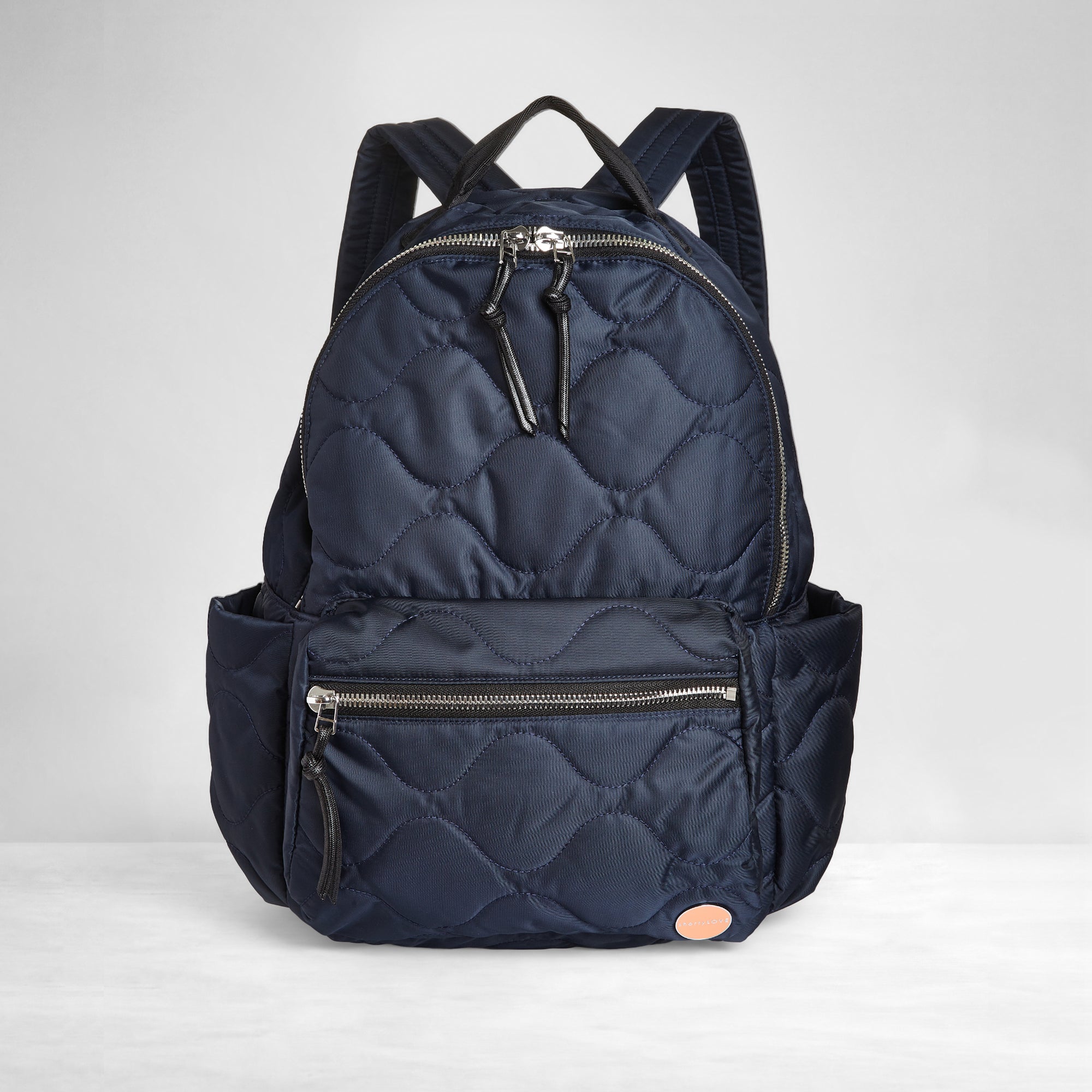 shortyLOVE tate backpack in midnight; front view against white background.