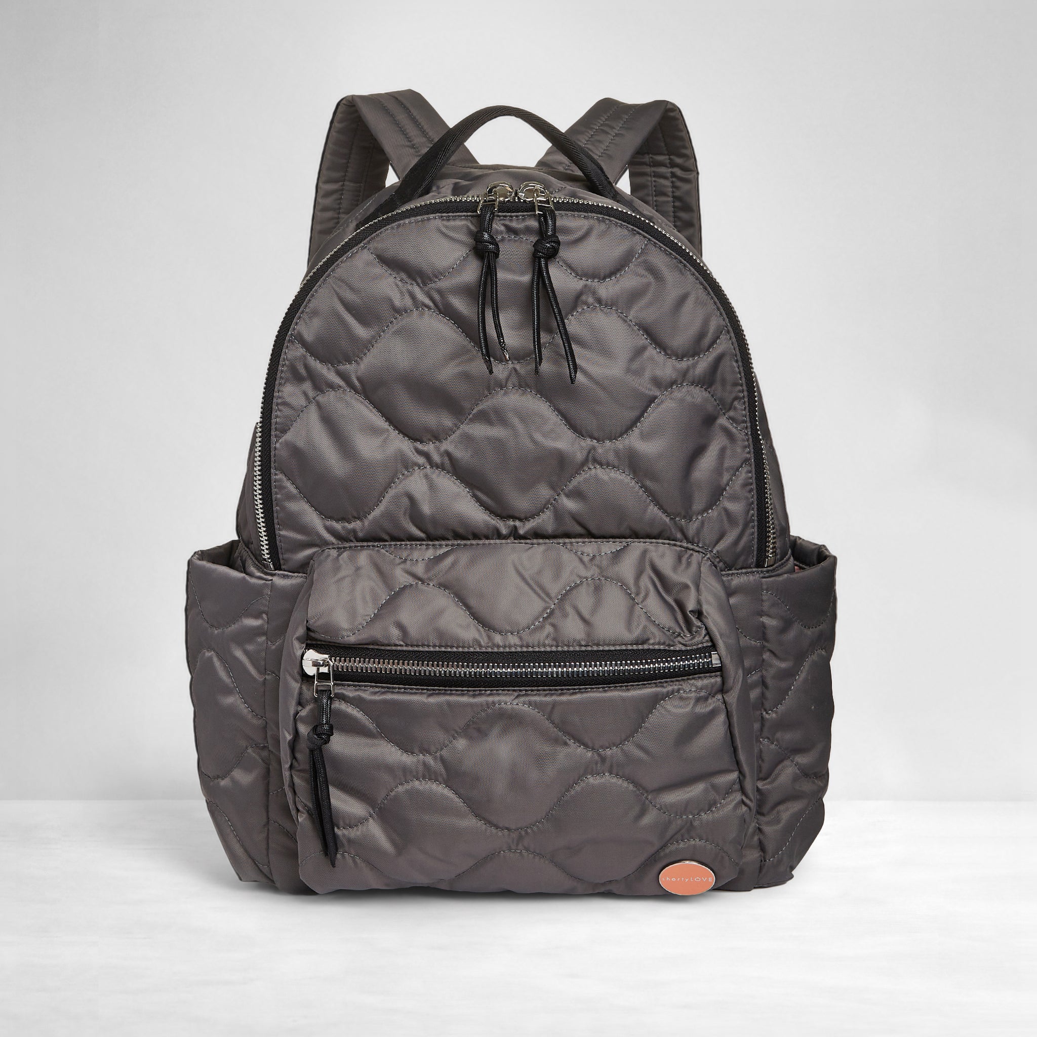 shortyLOVE tate backpack in pewter; front view against white background.