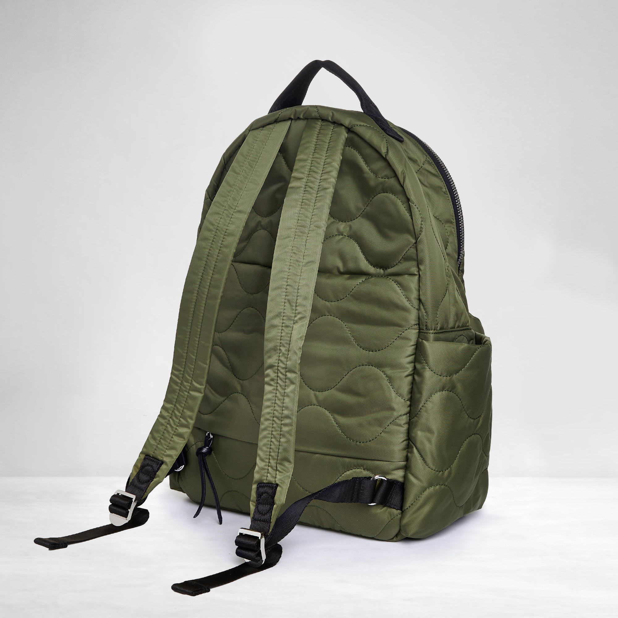 shortyLOVE tate backpack in sage; back view against white background.