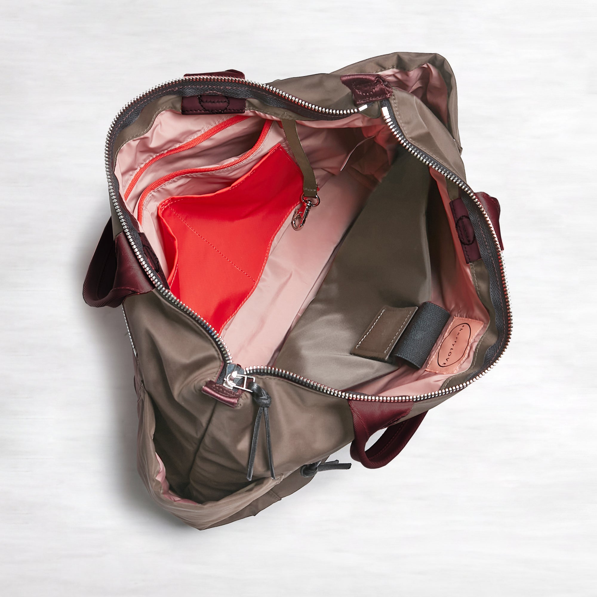 shortyLOVE tillie tote bag in mocha; top-down view showing interior mocha lining against white background.