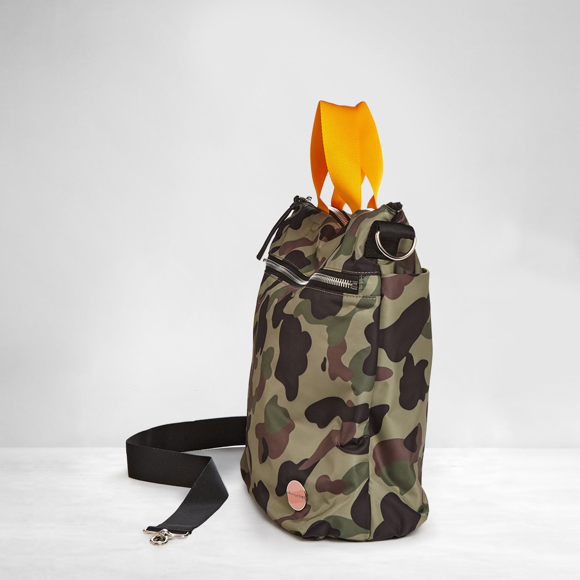 shortyLOVE wonder large crossbody/messenger bag in green camo; side view against white background.