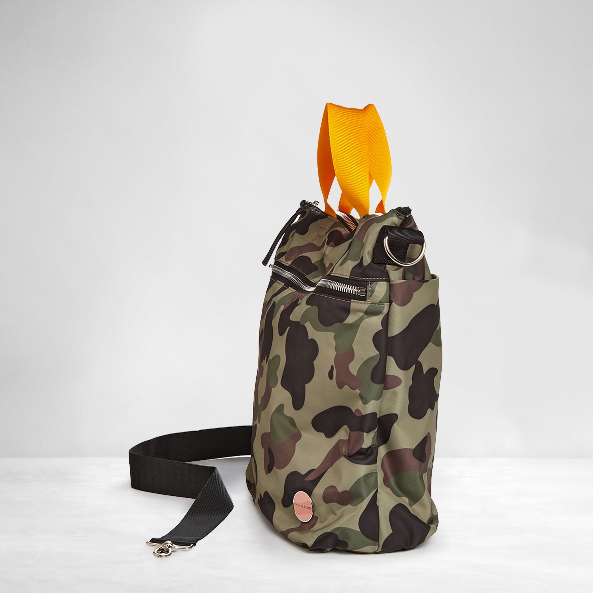 shortyLOVE wonder large crossbody/messenger bag in green camo; side view against white background.