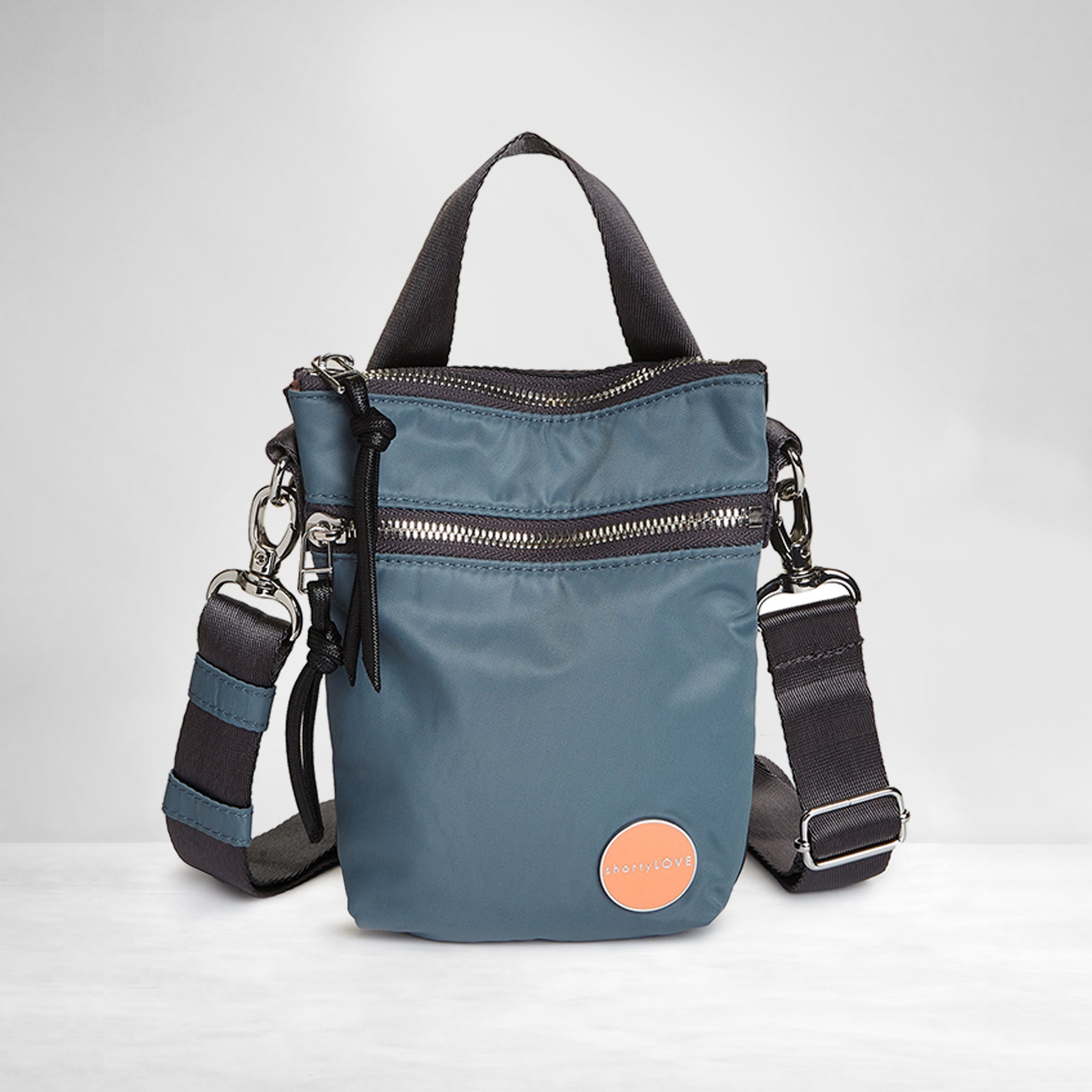 shortyLOVE shorthand small crossbody bag in steel blue/charcoal; front view against white background.