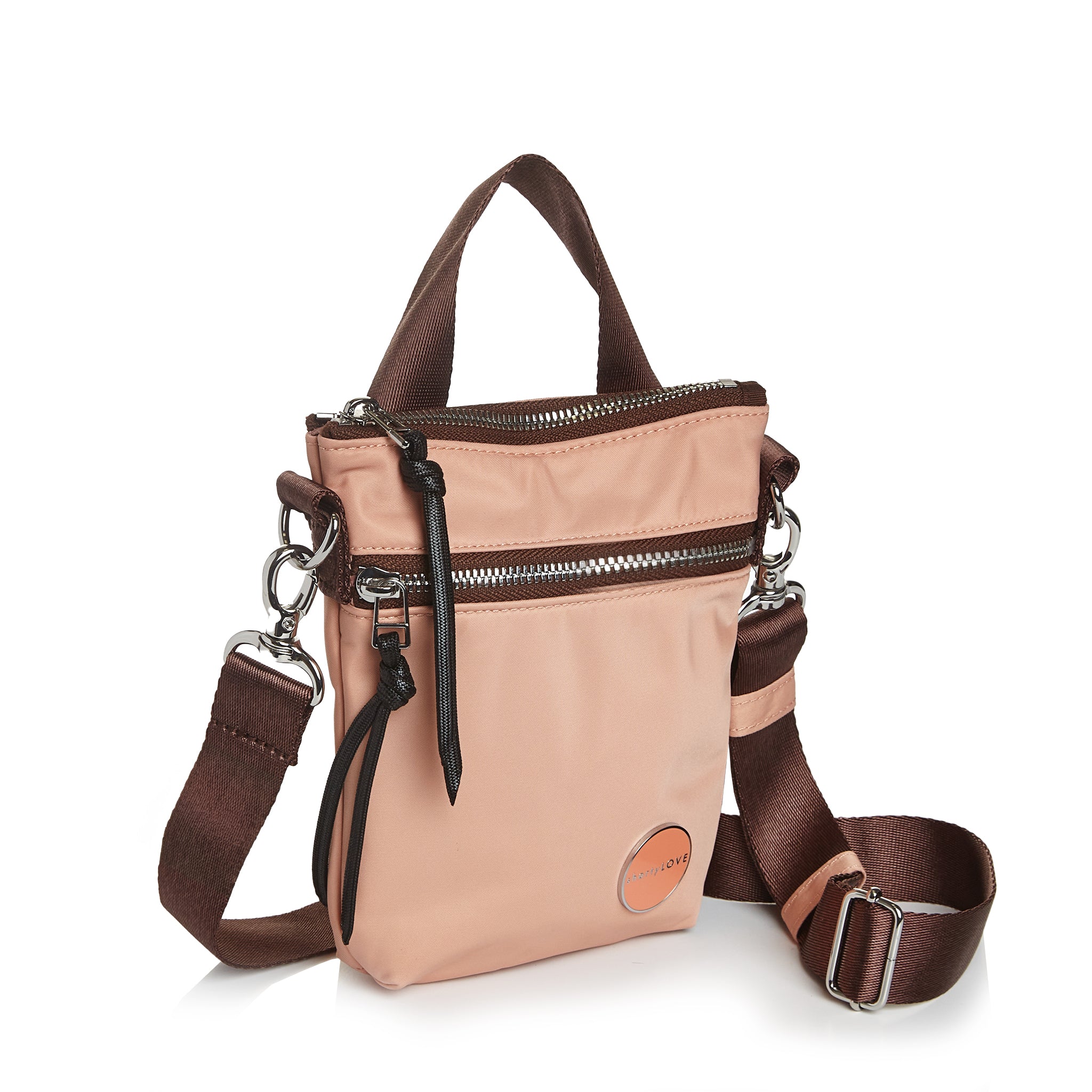 shortyLOVE shorthand small crossbody bag in dusty peach; side angle view against white background.