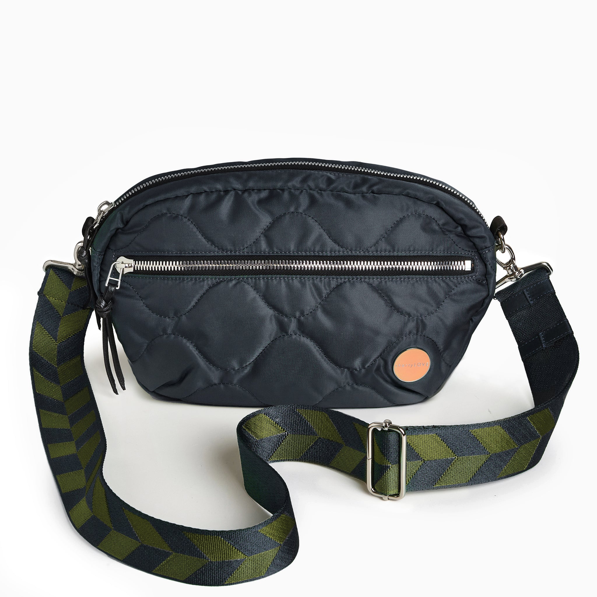 shortyLOVE boardwalk strap in arrow design in midnight/sage; shown with cruiser bag in midnight.