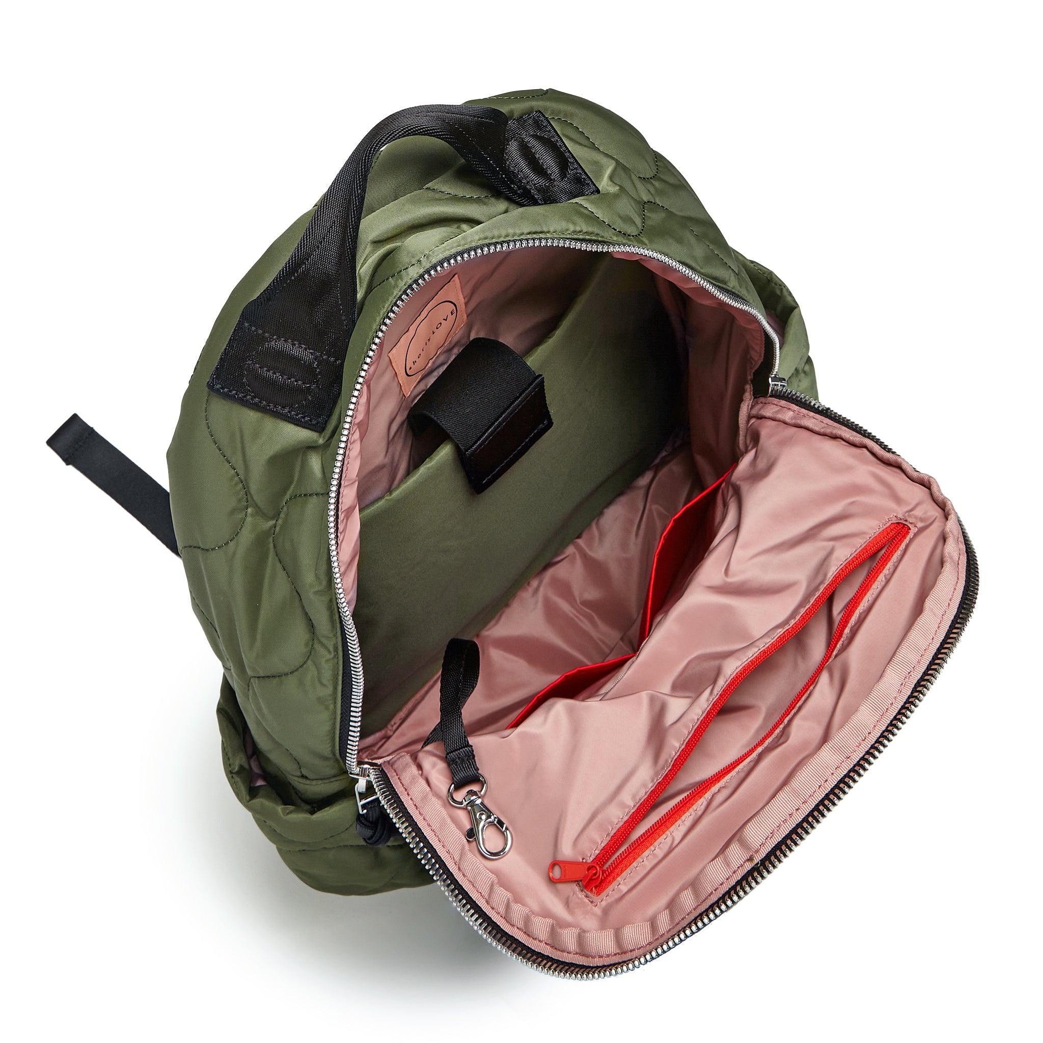 shortyLOVE tate backpack in sage; top-down view showing interior blush lining against white background.