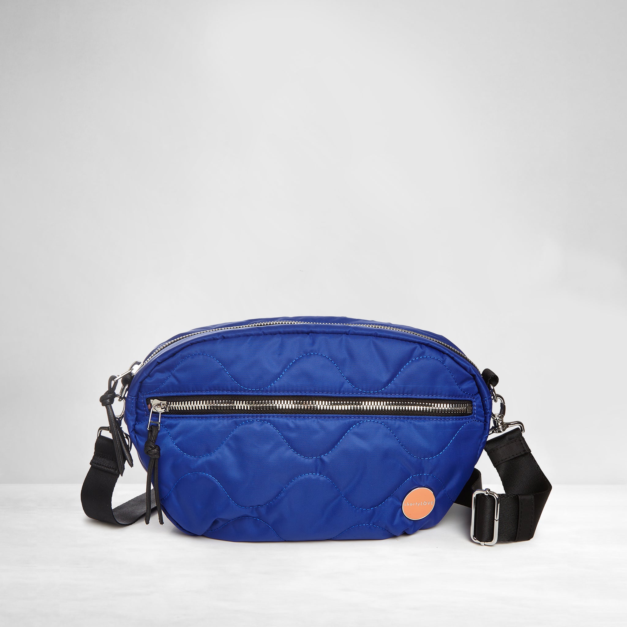 shortyLOVE cruiser medium crossbody bag in electric blue; front view against white background.