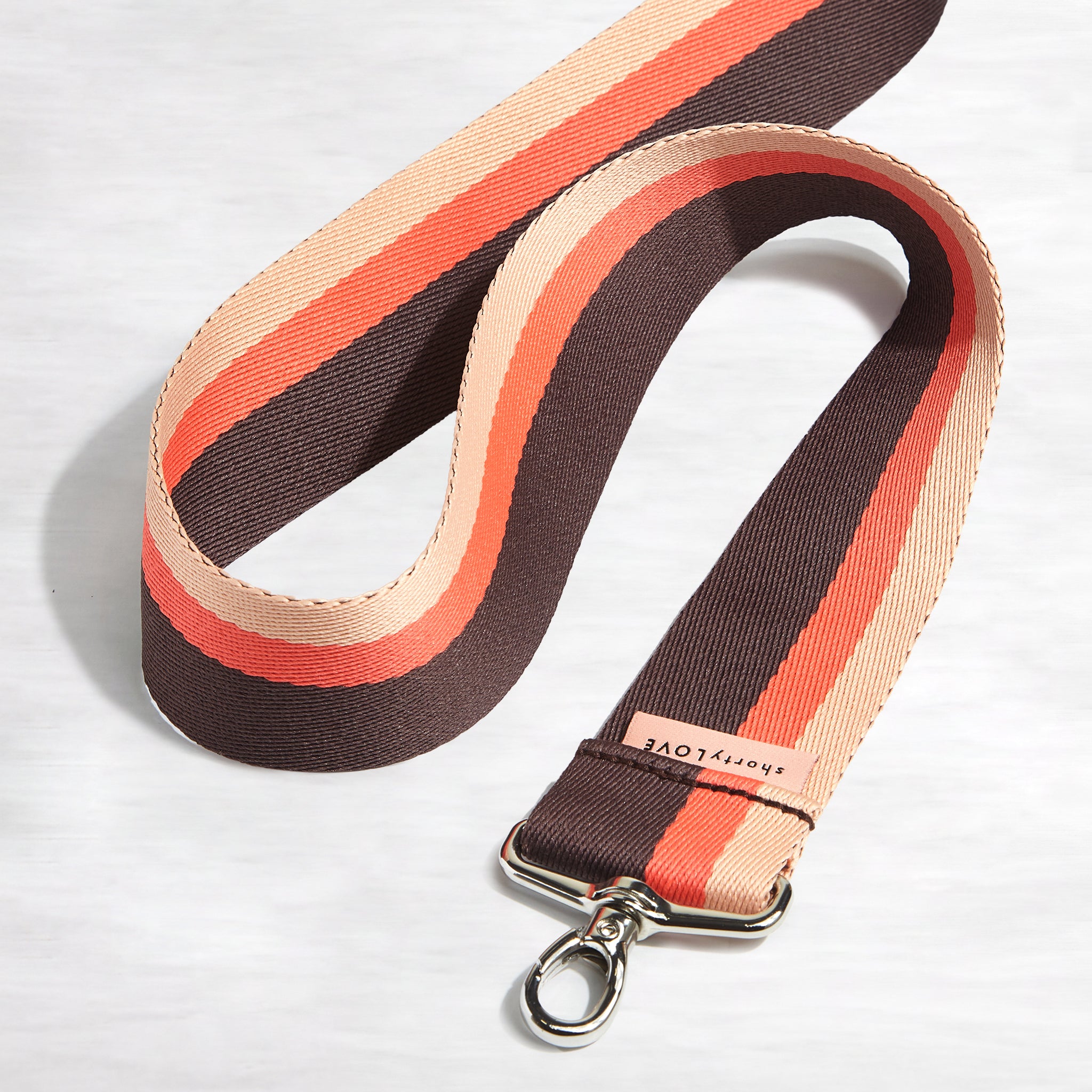 shortyLOVE boardwalk strap in chocolate/peach/coral; top view open against white background.