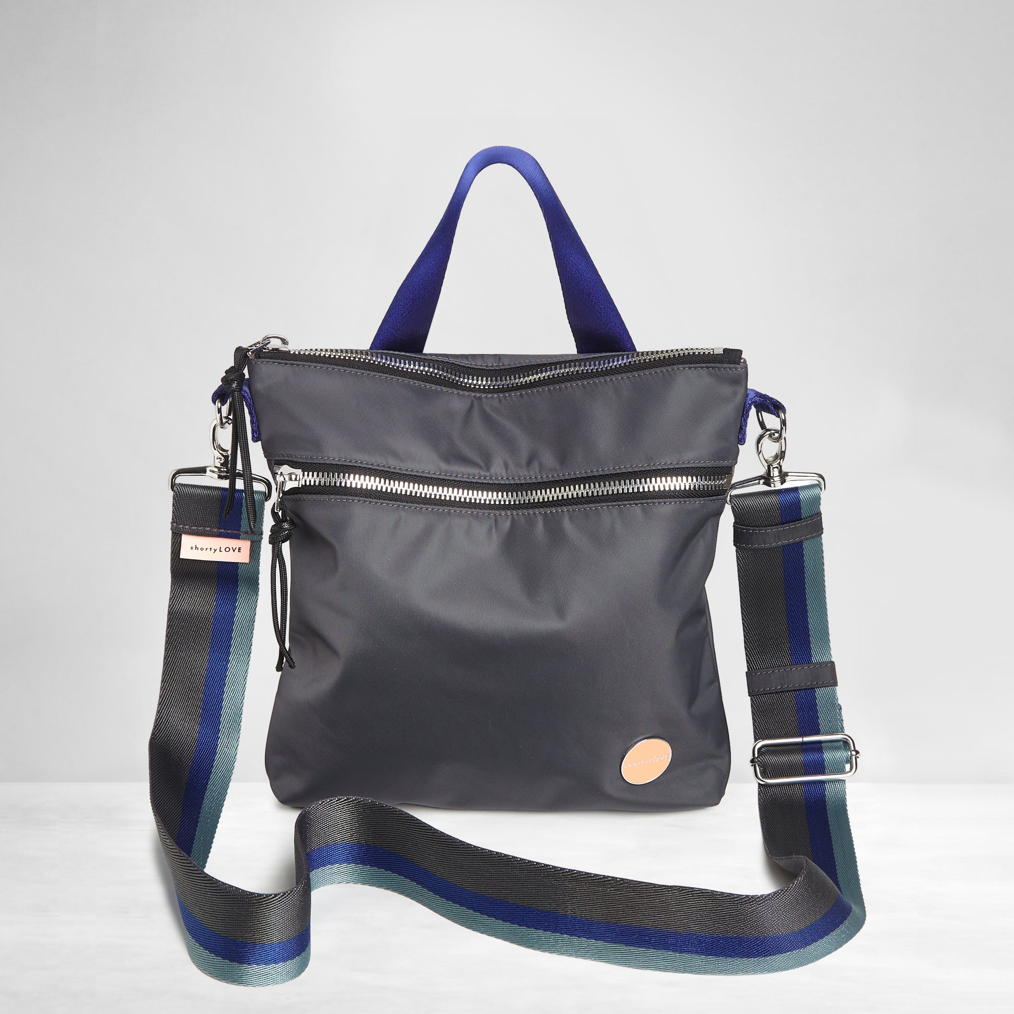 shortyLOVE boardwalk strap in charcoal/violet/steel; shown with amuse bag in charcoal.