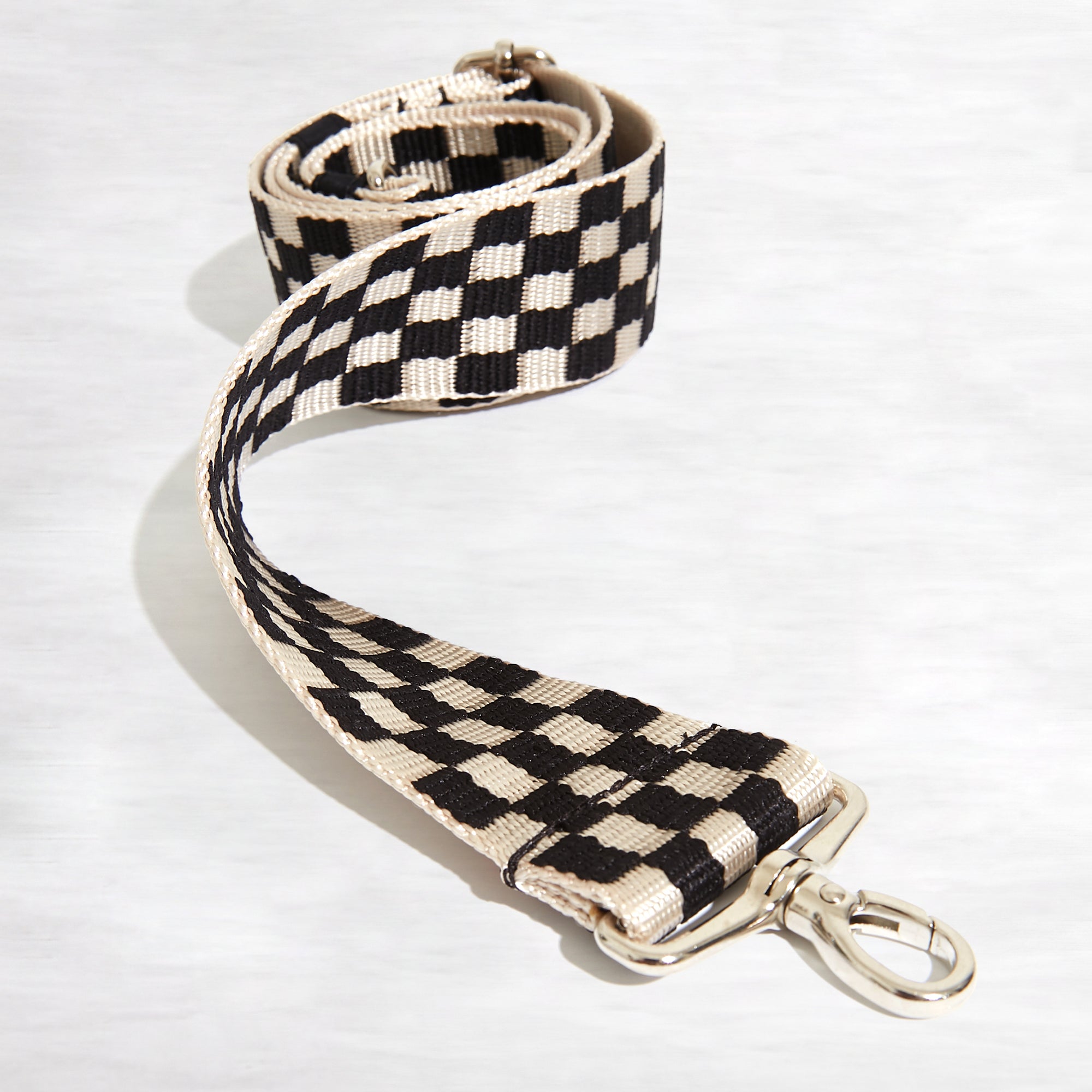 shortyLOVE boardwalk strap in black/white checker; front view against white background