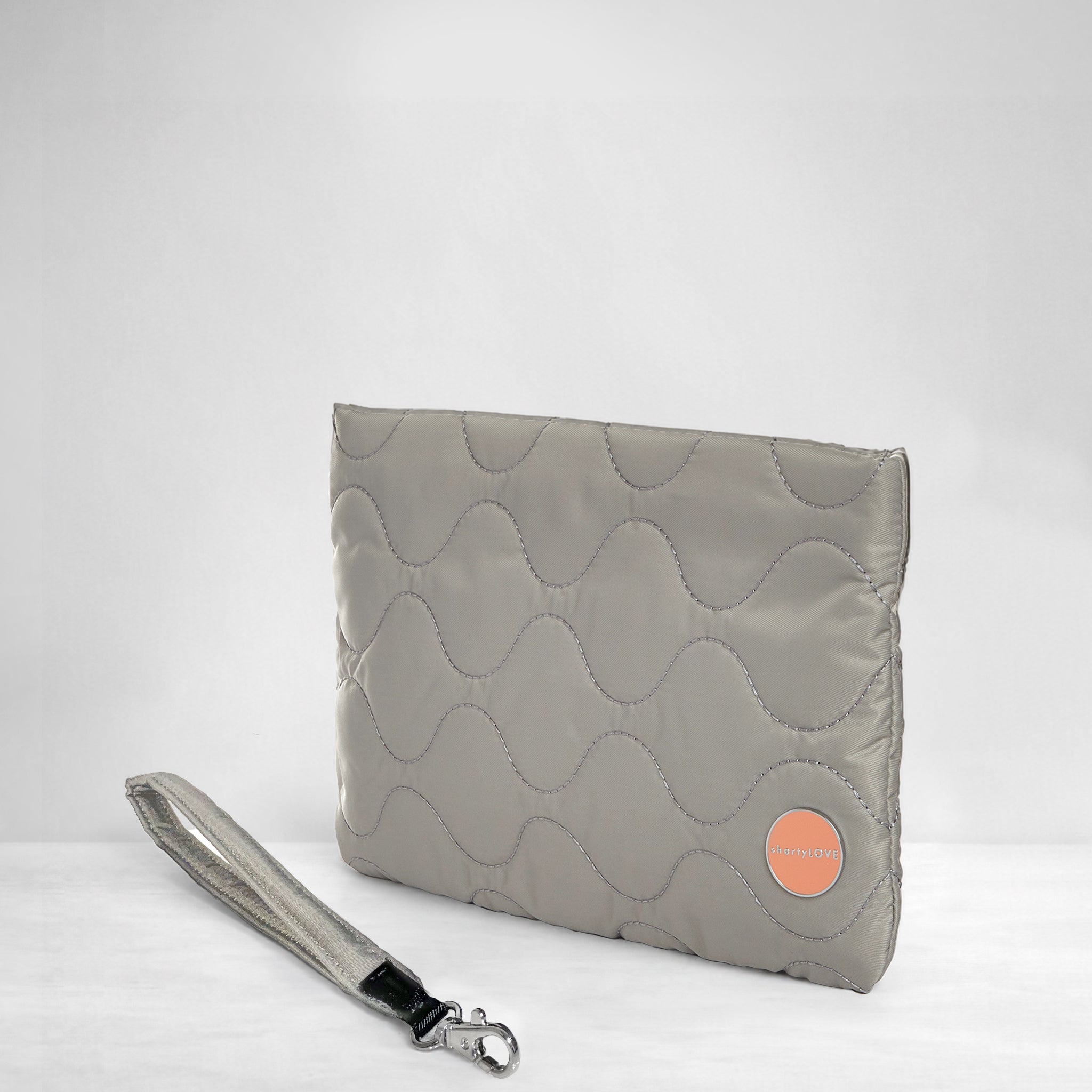 shortyLOVE cleo wristlet clutch in milky grey; side view against white background.