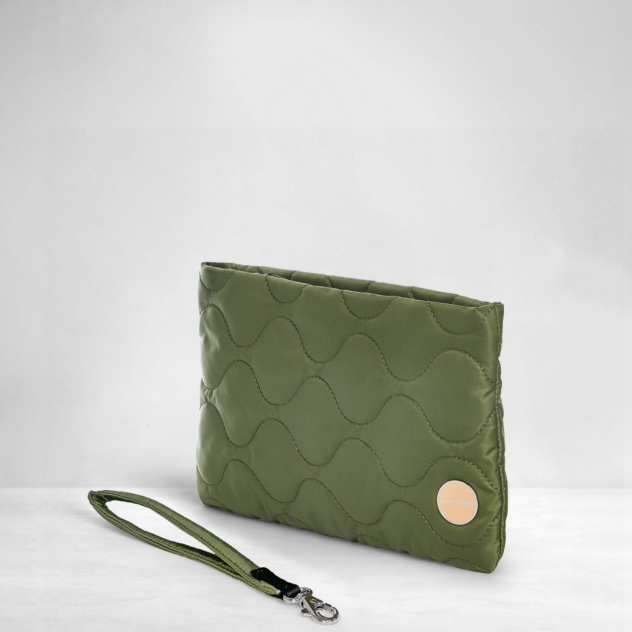 shortyLOVE cleo wristlet clutch in sage; side view against white background.