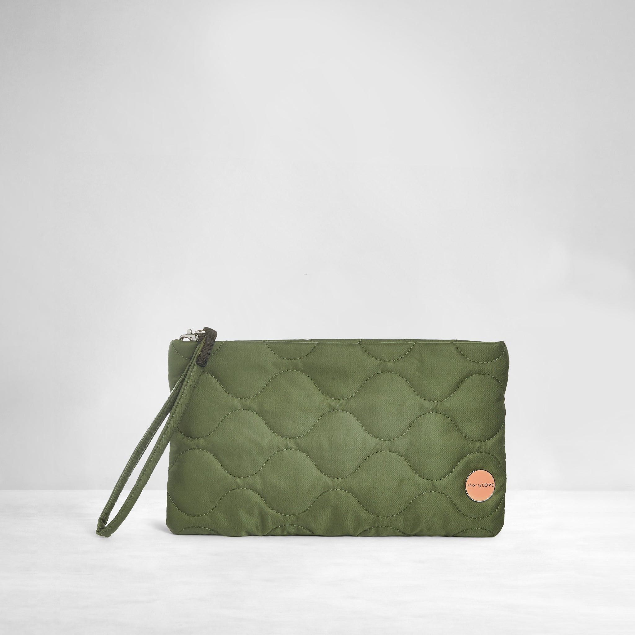 shortyLOVE cleo wristlet clutch in sage; front view against white background.