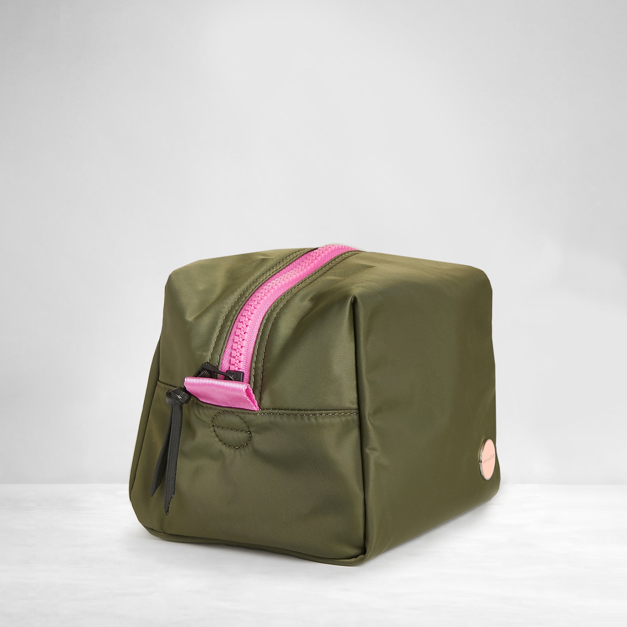 shortyLOVE stevie cosmetic bag in army green; side angle view against white background.