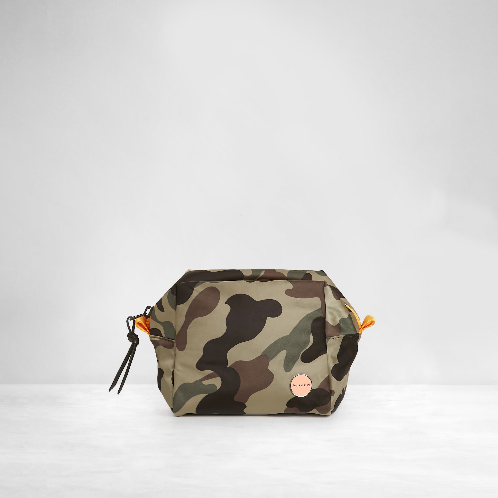 shortyLOVE stevie cosmetic bag in green camo; front view against white background.