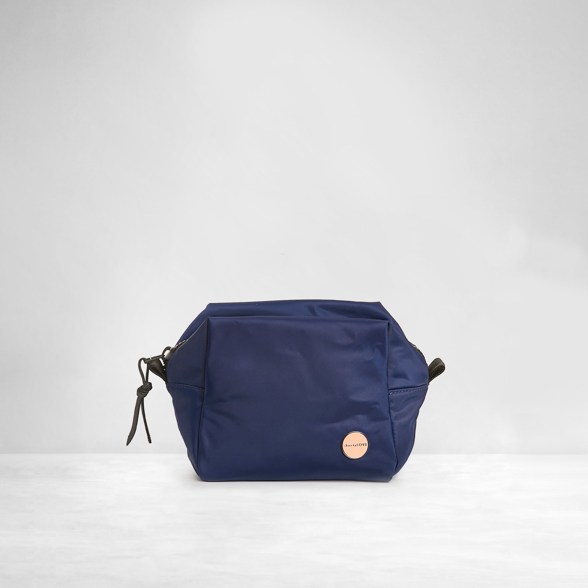 shortyLOVE stevie cosmetic bag in navy; front view against white background.
