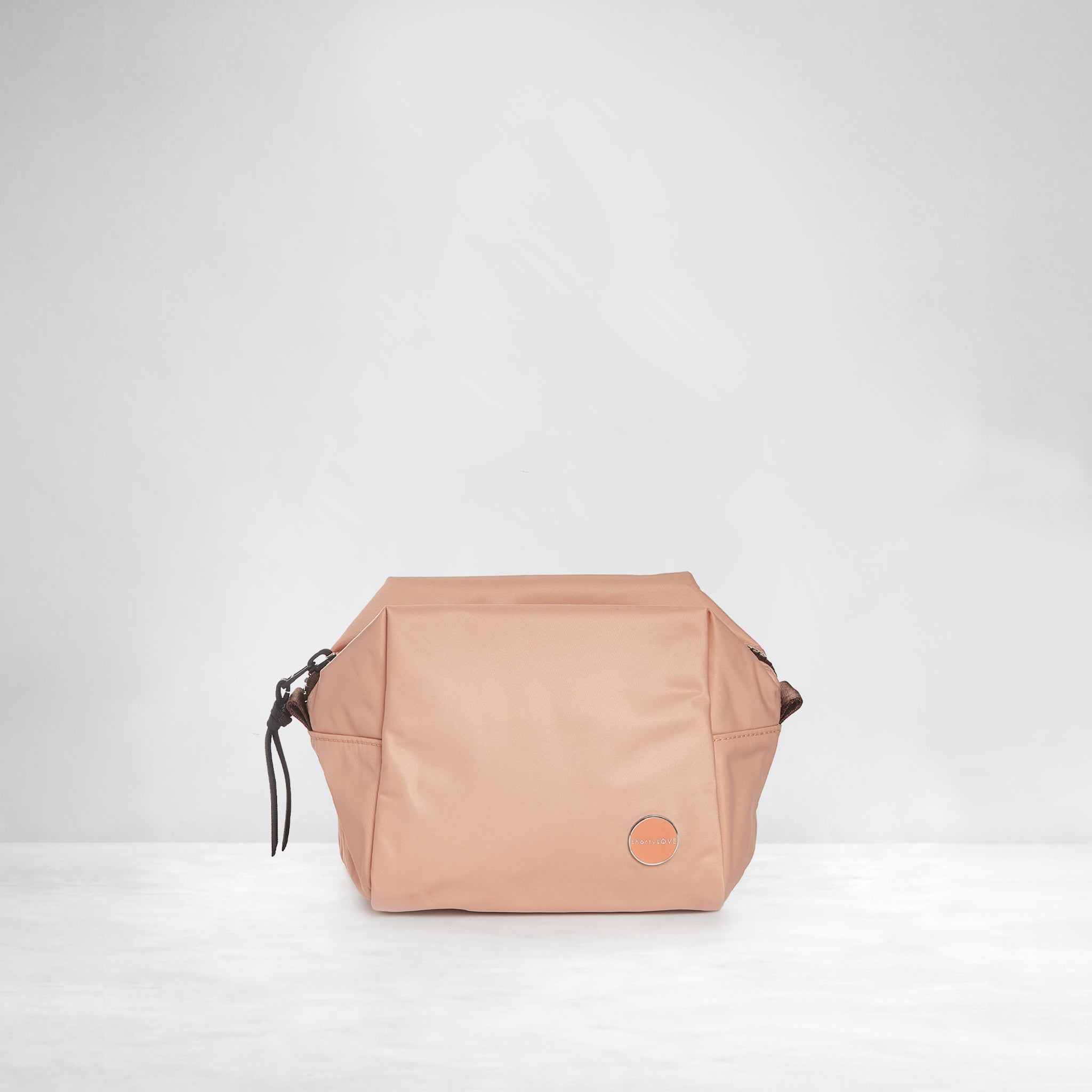 shortyLOVE stevie cosmetic bag in dusty peach pink; front view against white background