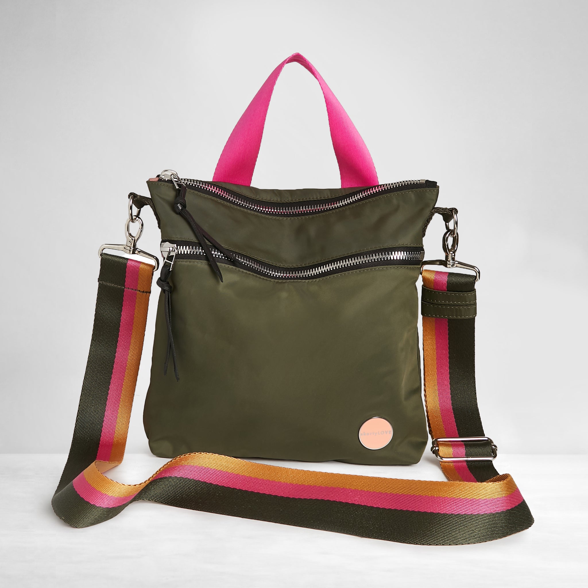 shortyLOVE boardwalk strap in green/yellow/fuchsia; shown with amuse bag in army green.