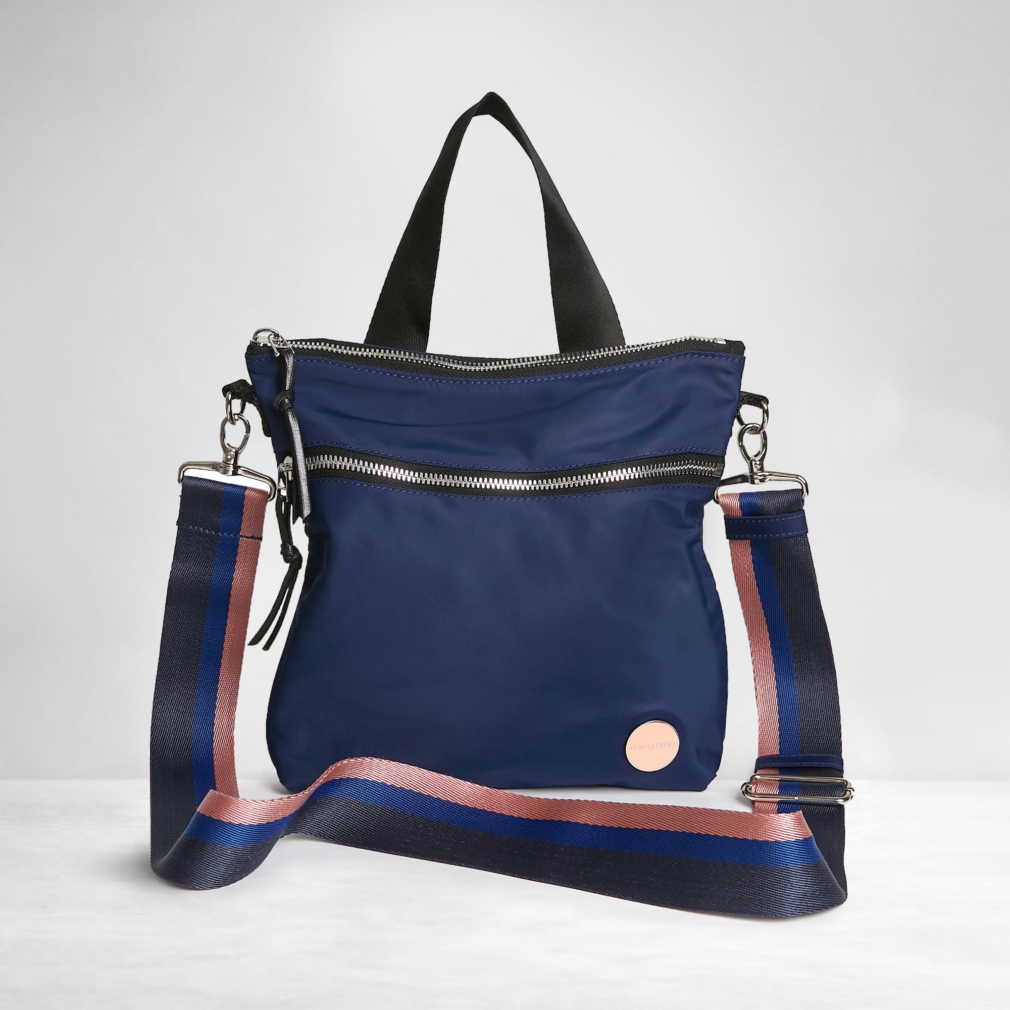 shortyLOVE boardwalk strap in navy/blue/pink; shown with amuse bag in navy.
