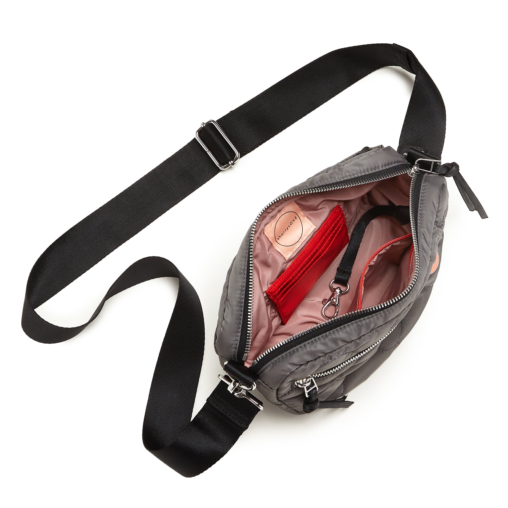 shortyLOVE small cruiser small crossbody bag in pewter; top-down view showing interior blush lining against white background.