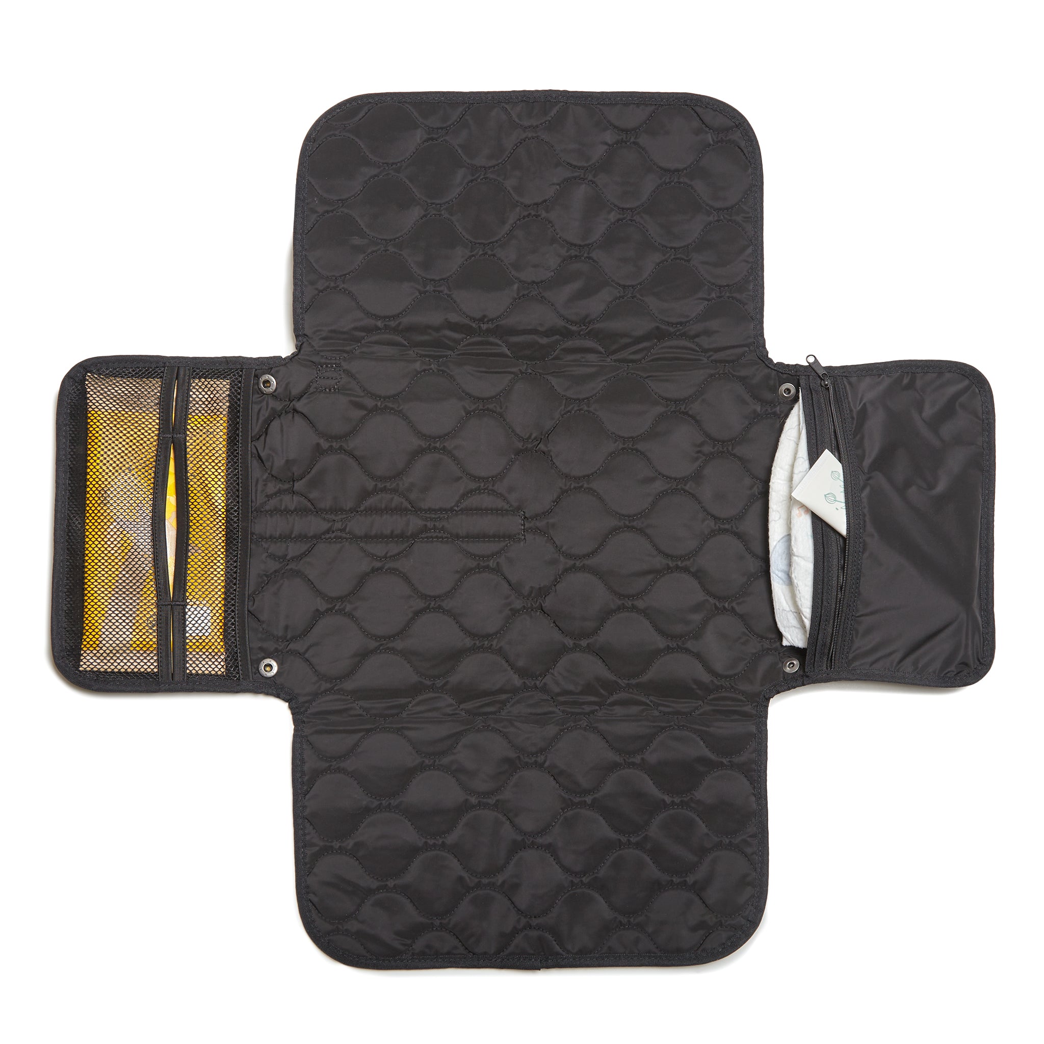 Black quilted diaper changing mat with multiple compartments on a white background