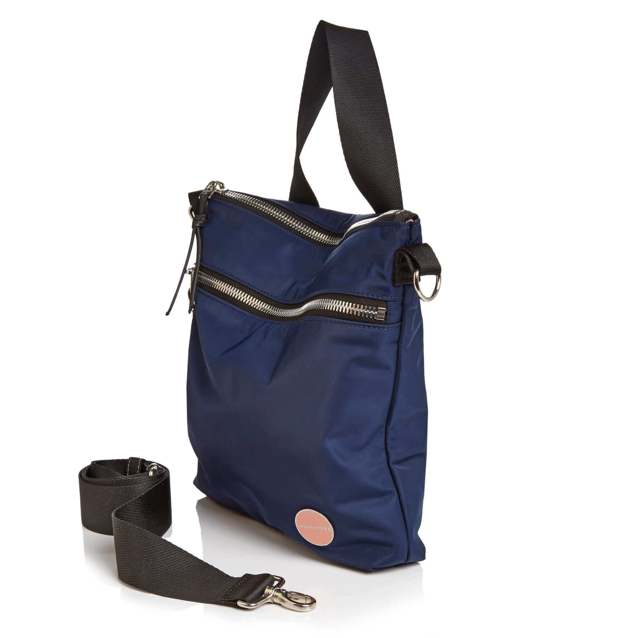 shortyLOVE amuse medium sized crossbody bag in navy; side angle view against white background.
