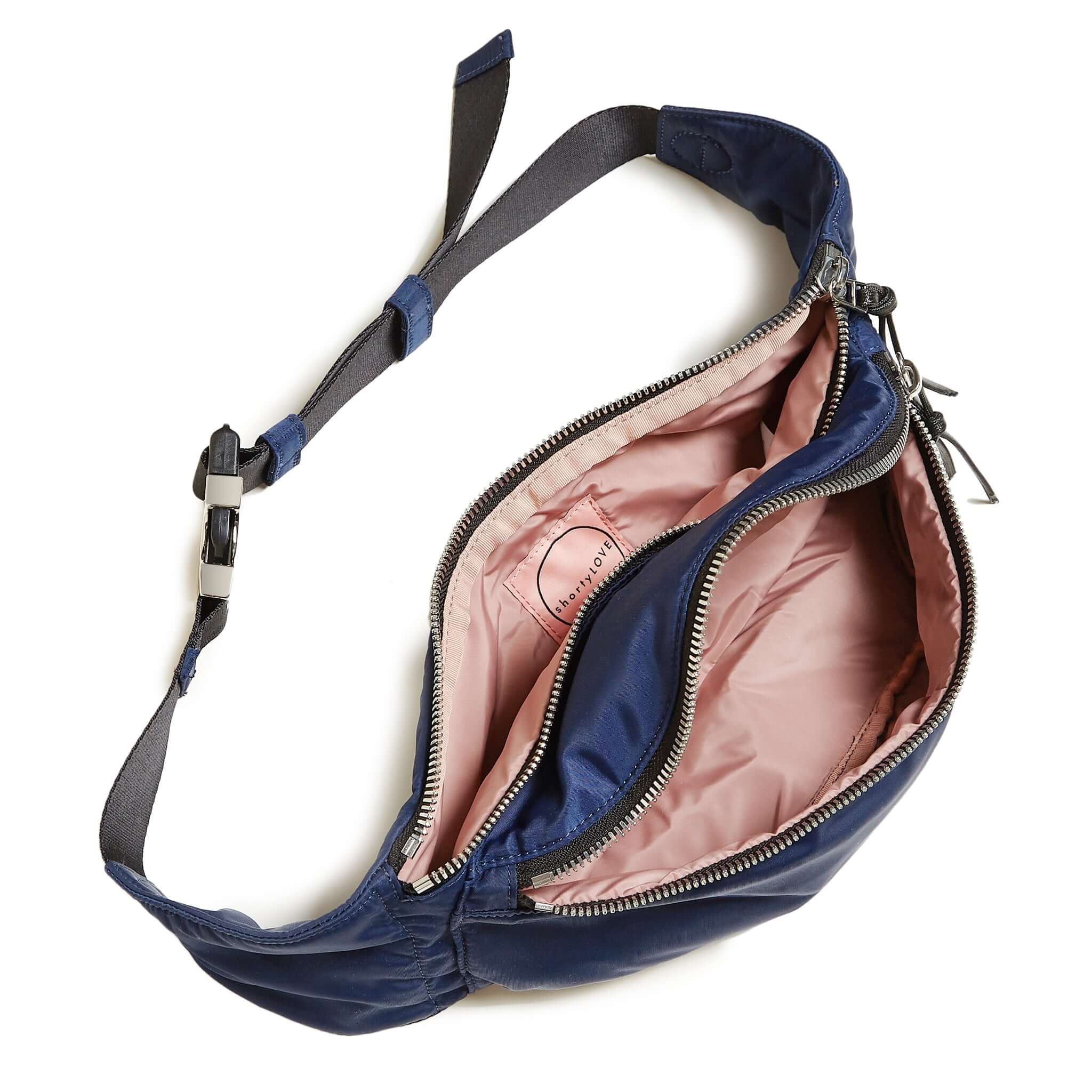 shortyLOVE arcade belt bag in navy; top-down view showing interior pink lining against white background.