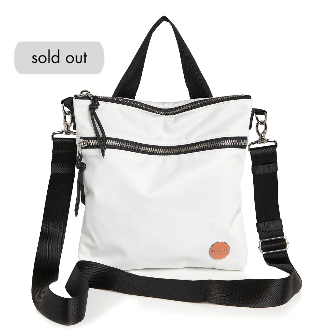 shortyLOVE amuse medium sized crossbody bag in white; front view against white background.