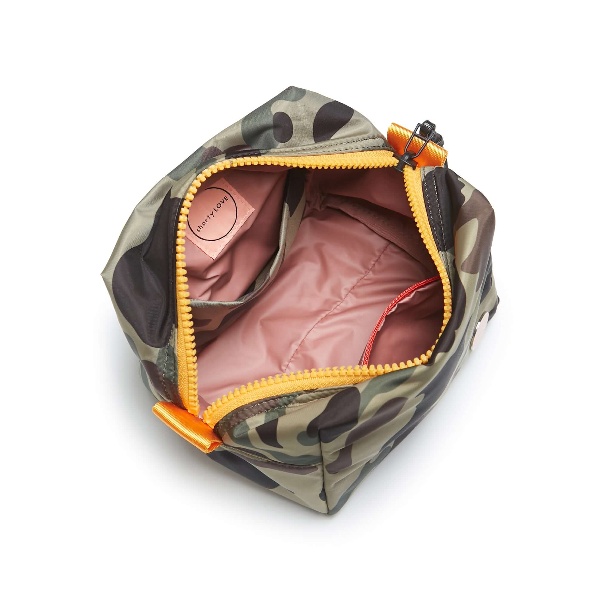 shortyLOVE stevie cosmetic bag in green camo; top-down view showing interior pink lining against white background.