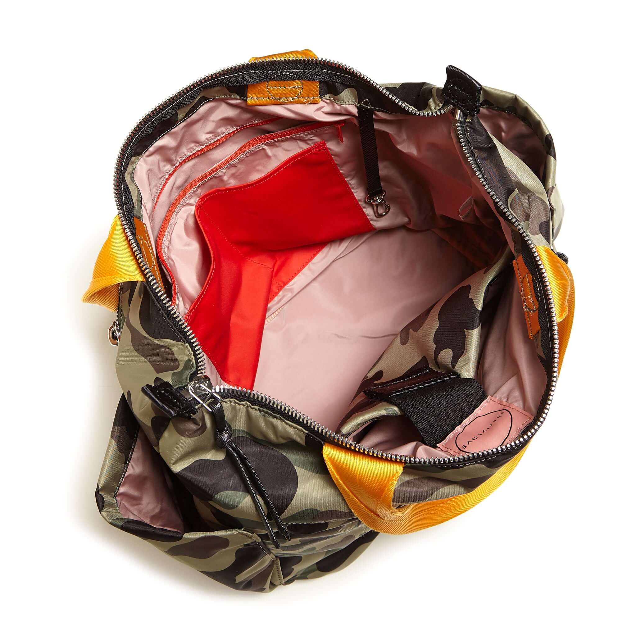 shortyLOVE tillie tote bag in green camo; top-down view showing interior pink lining against white background.