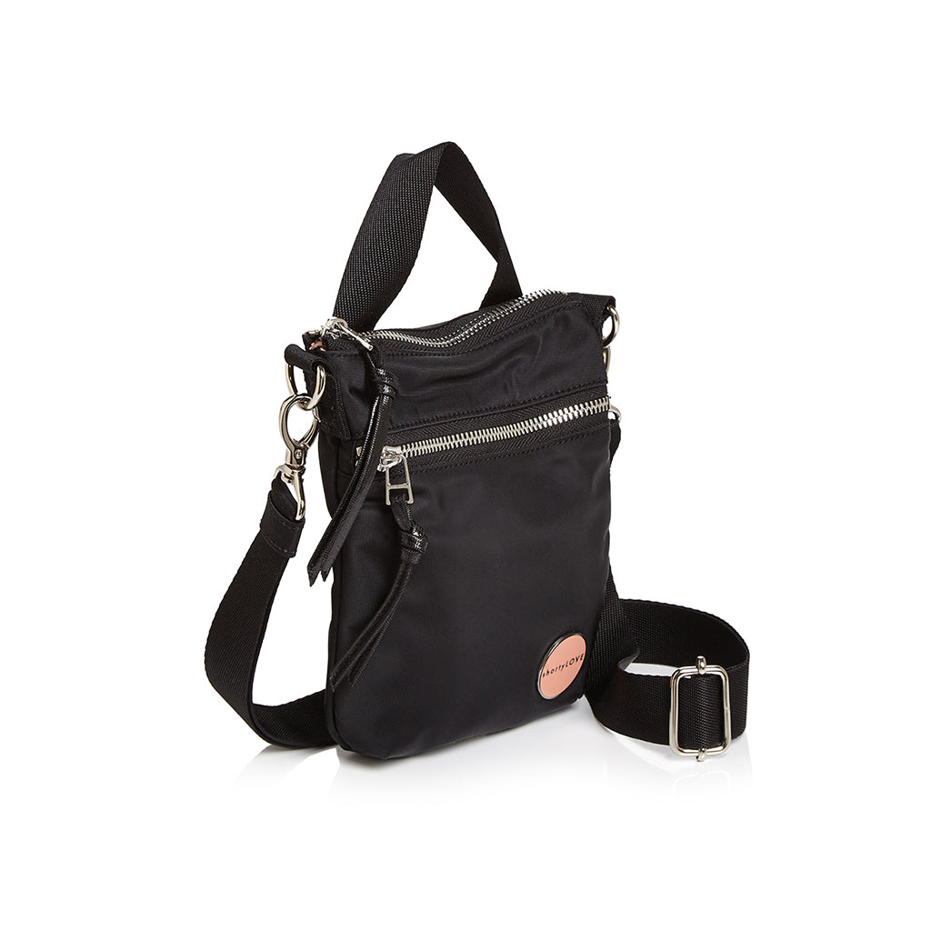 shortyLOVE shorthand crossbody phone bag in black; side angle view against white background